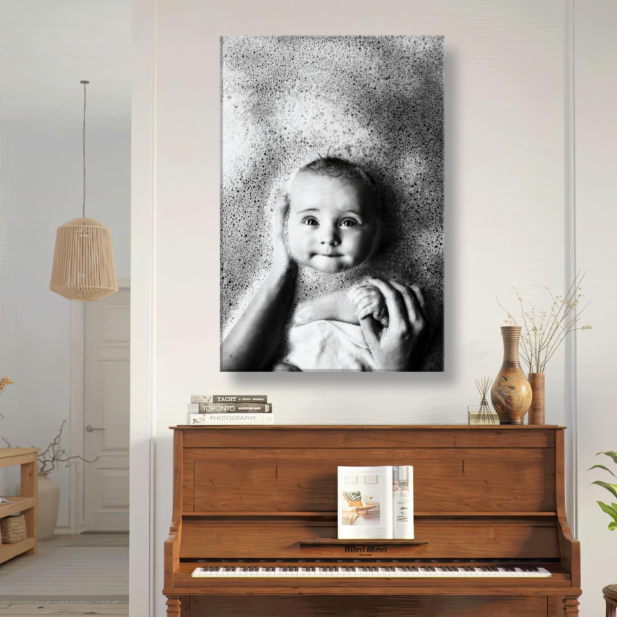 Black-and-white canvas print of a smiling baby surrounded by bubbles, showcasing joyful bath time moments.