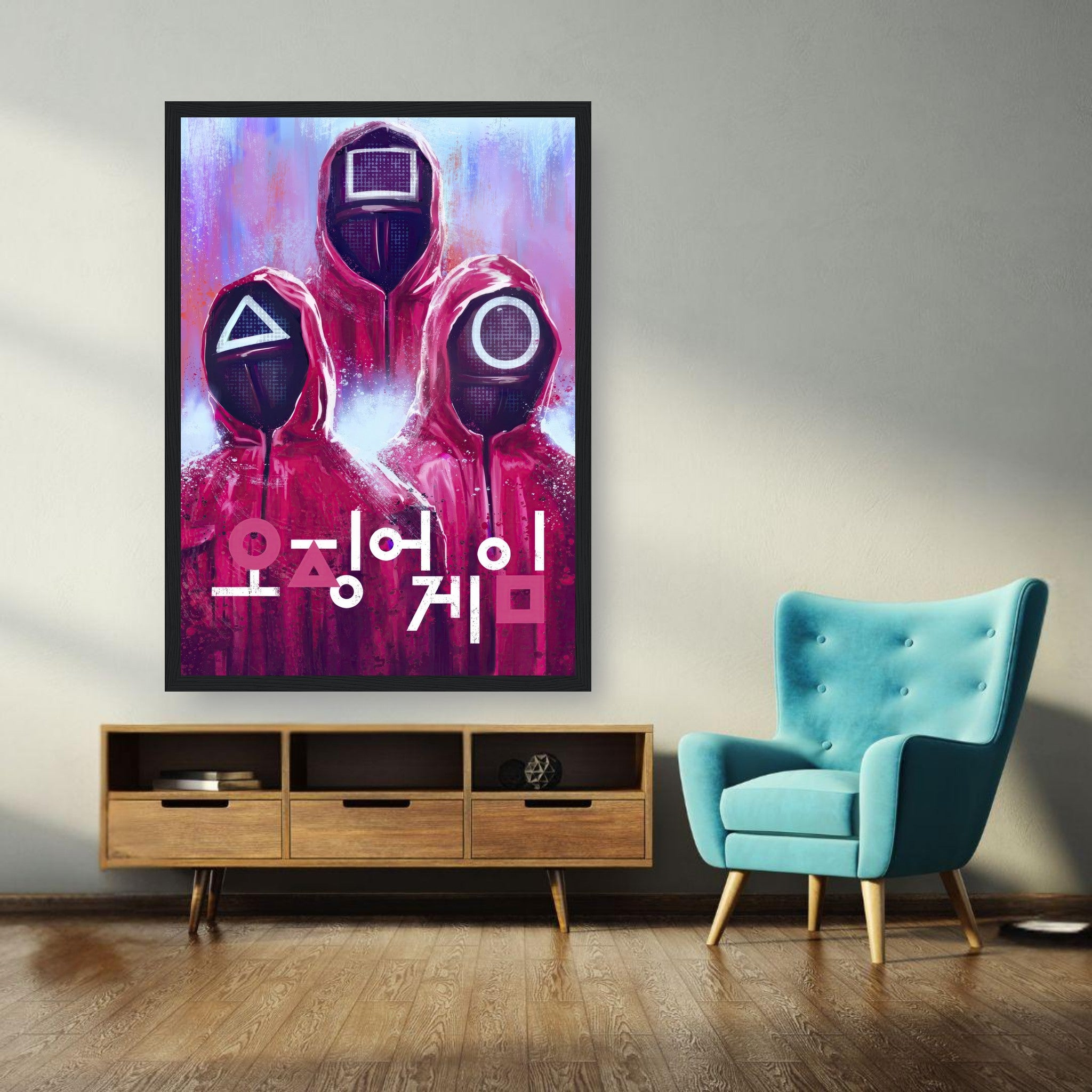 Squid Game framed poster featuring iconic guards in red suits and geometric masks with bold Korean typography.