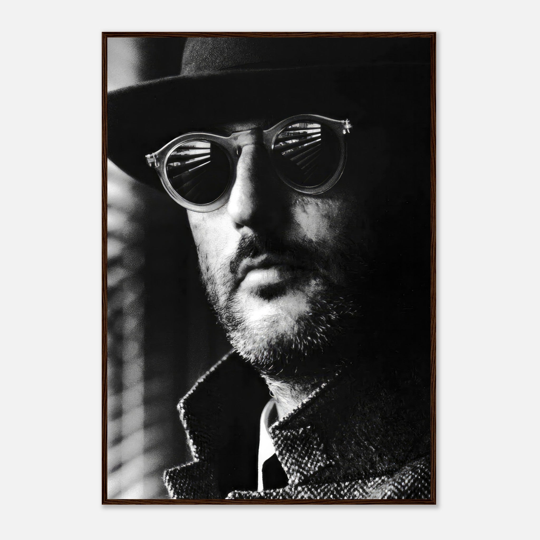Jean Reno Leon Photography framed print featuring a close-up of a man in a hat and sunglasses, evoking mystery and elegance.