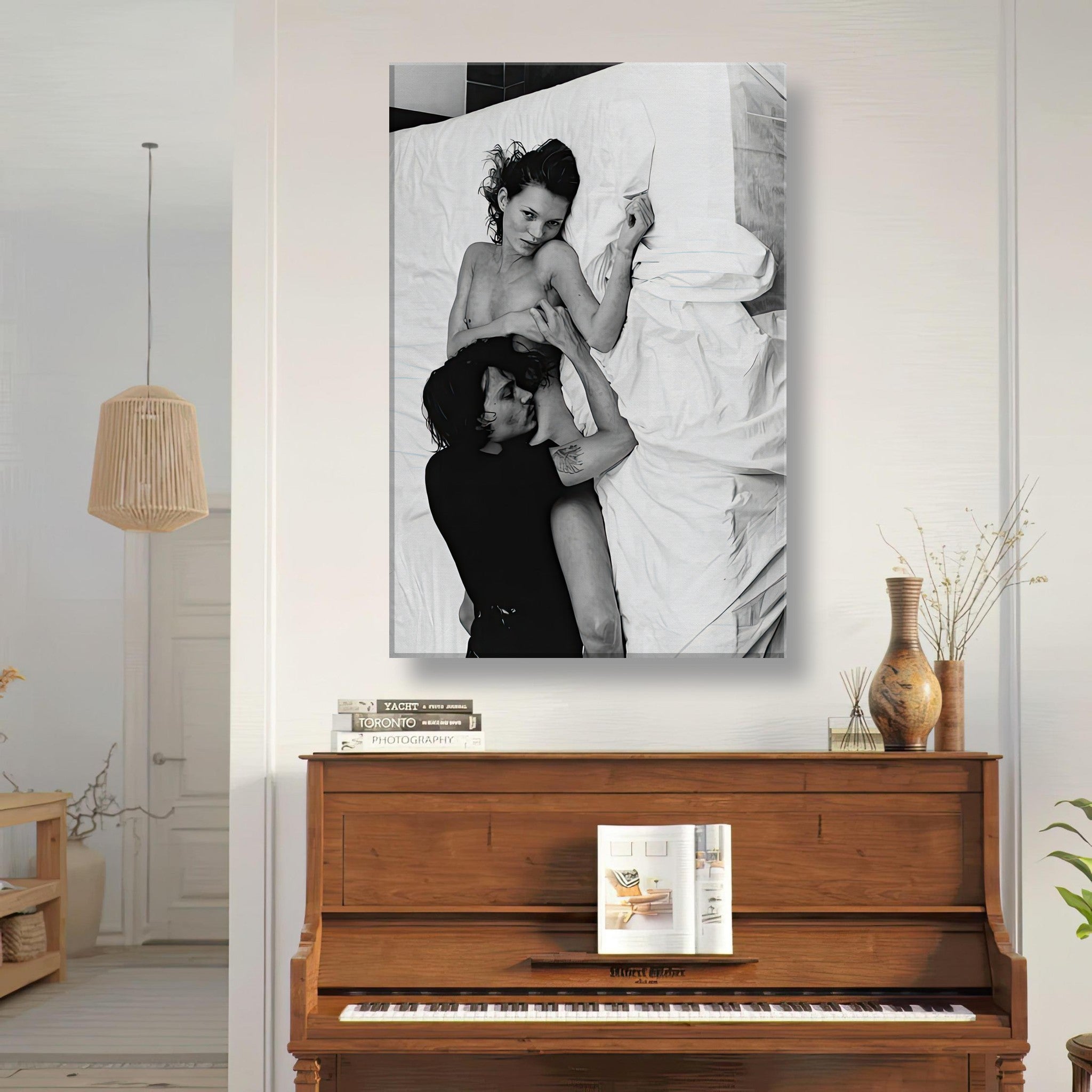 Black-and-white canvas print of Kate Moss and Johnny Depp, capturing 90s glamour and chemistry in an intimate setting.
