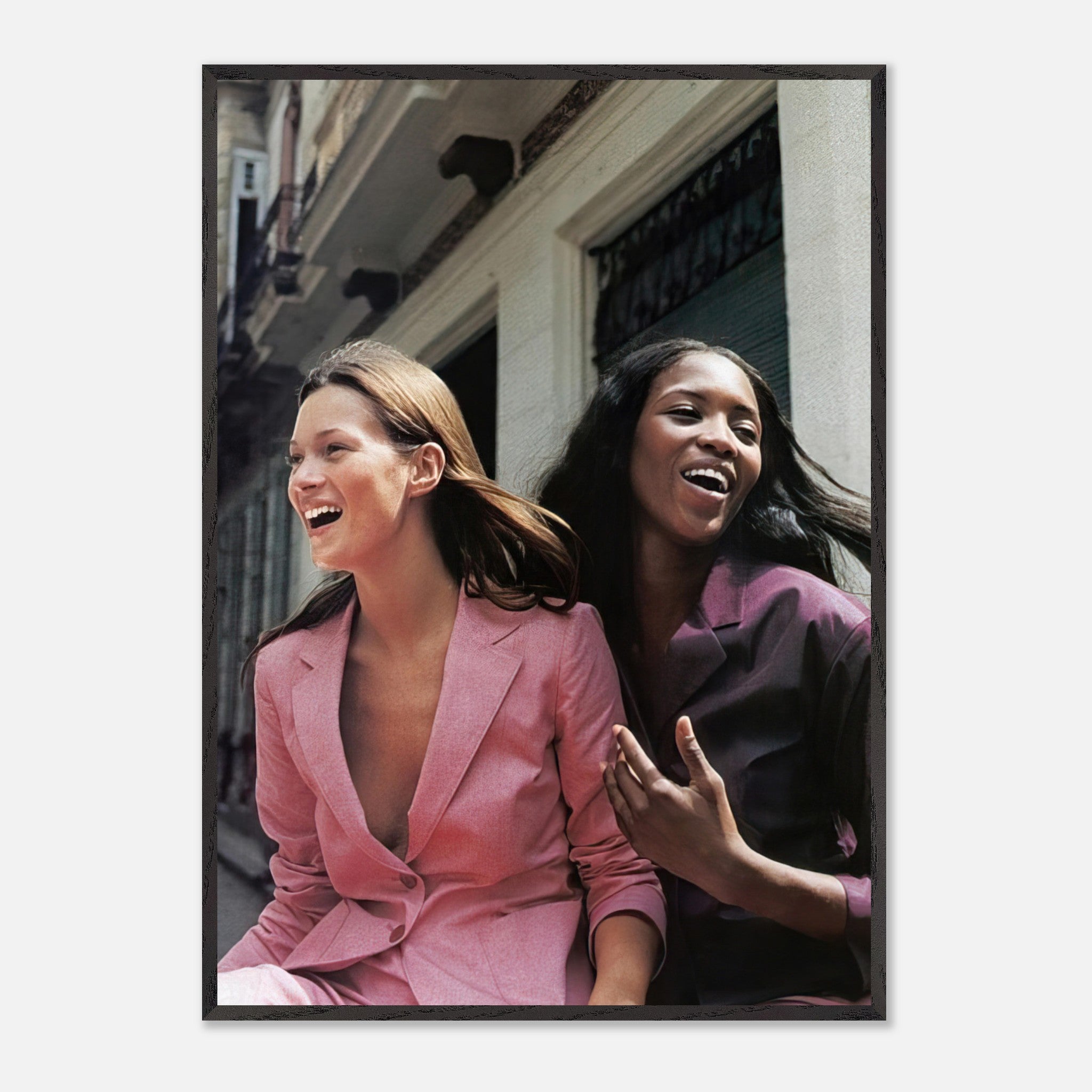 Naomi Campbell and Kate Moss in vibrant outfits, showcasing timeless beauty and friendship in a museum-quality fine art print.
