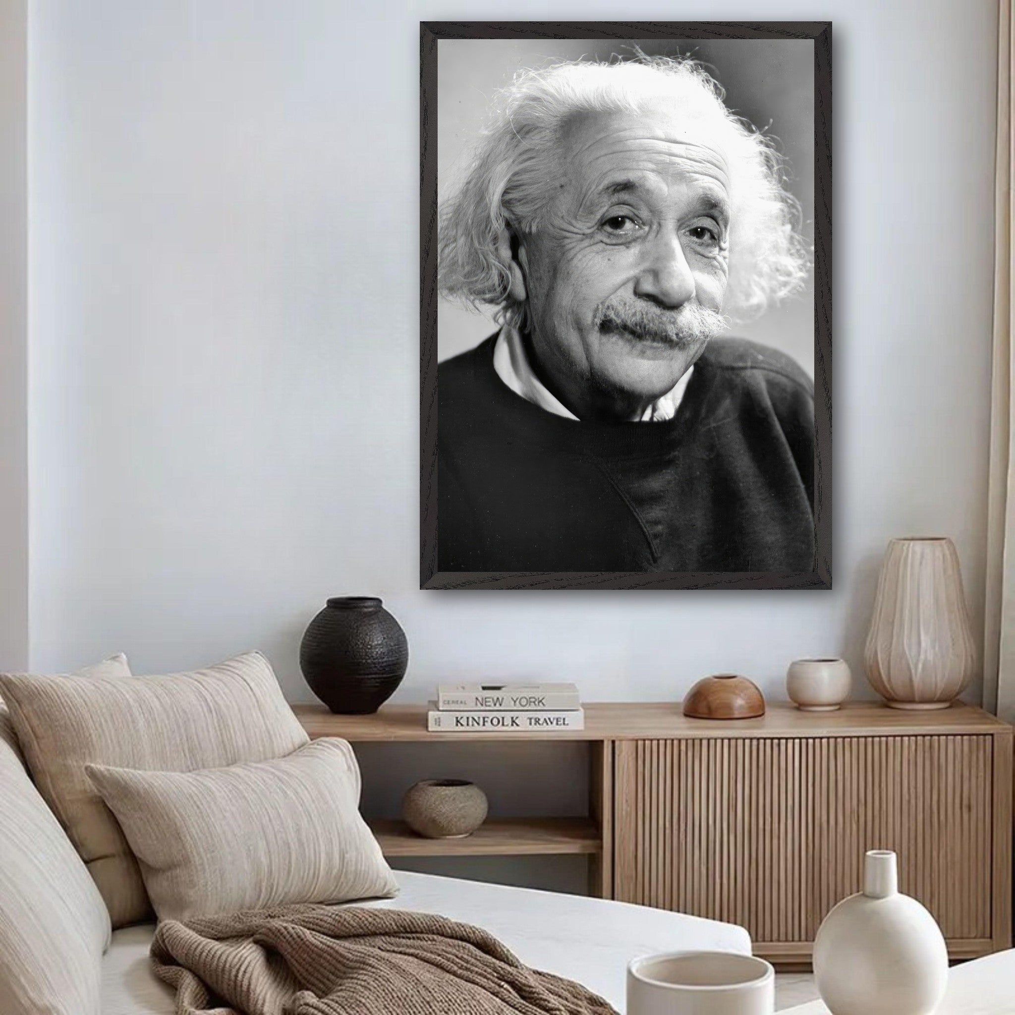 Black-and-white portrait of Albert Einstein (1946) displayed in a modern living room decor.
