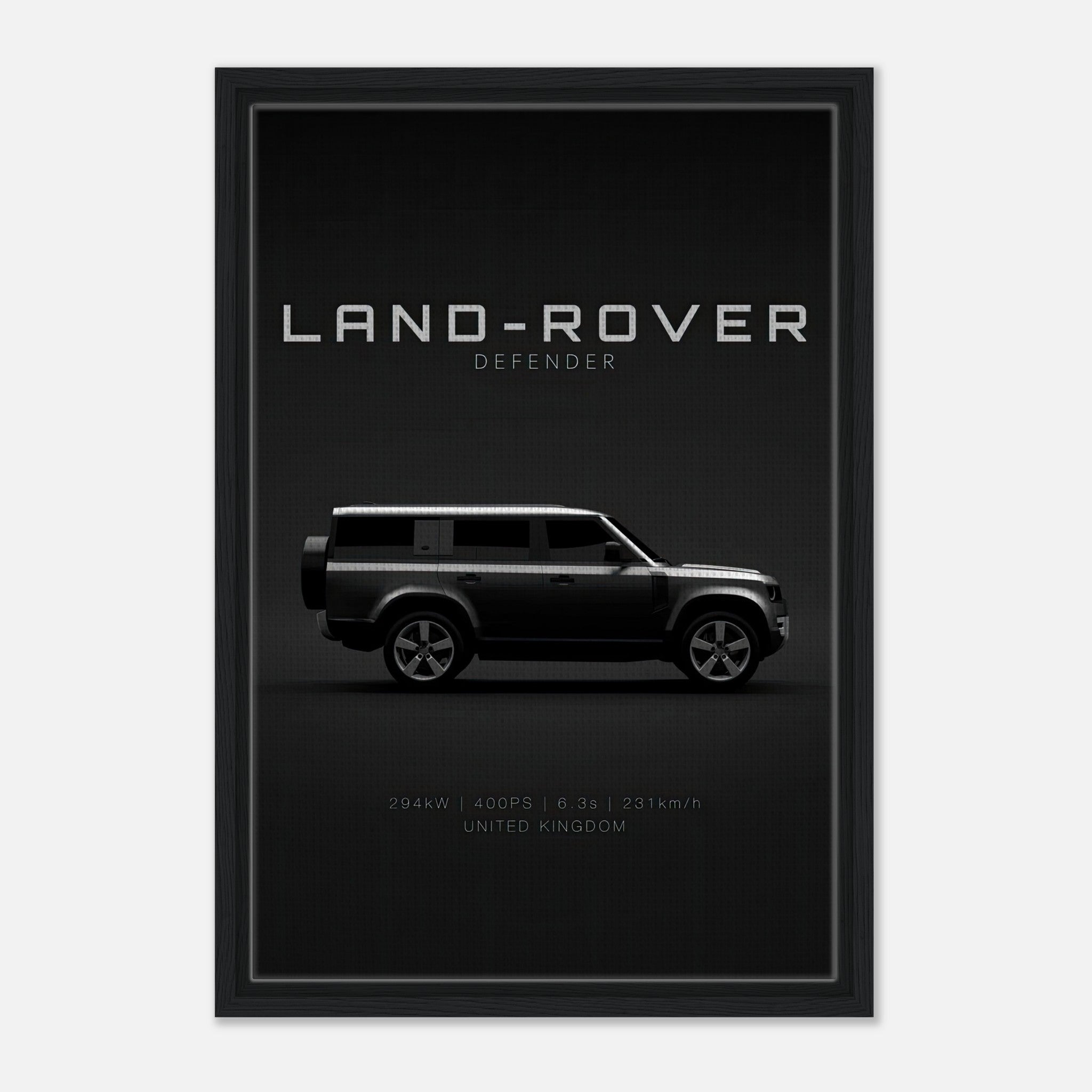 Framed canvas print of a Land Rover Defender with sleek side profile on a black backdrop.