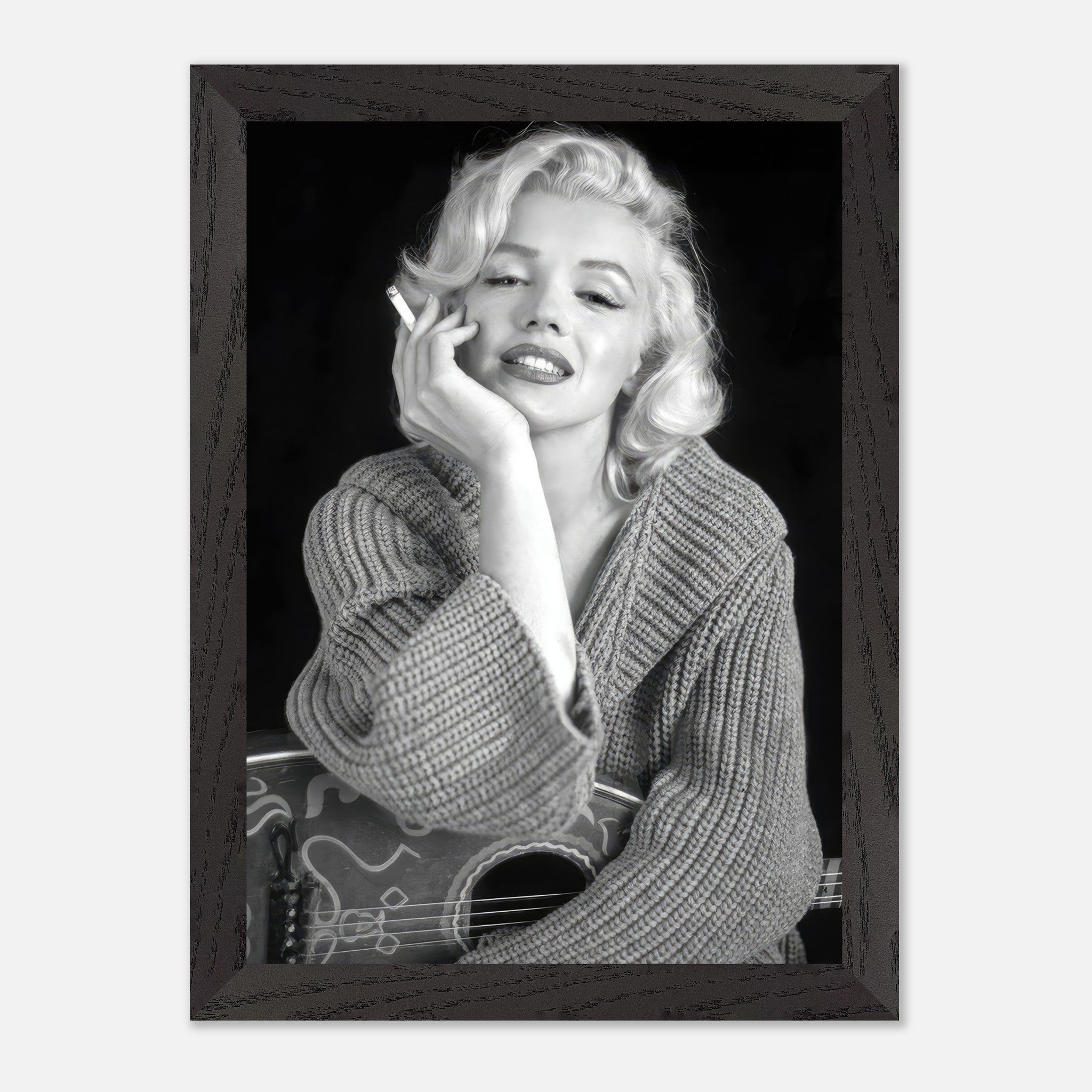 Vintage framed print of Marilyn Monroe smoking, showcasing her iconic glamour and charm in black-and-white.