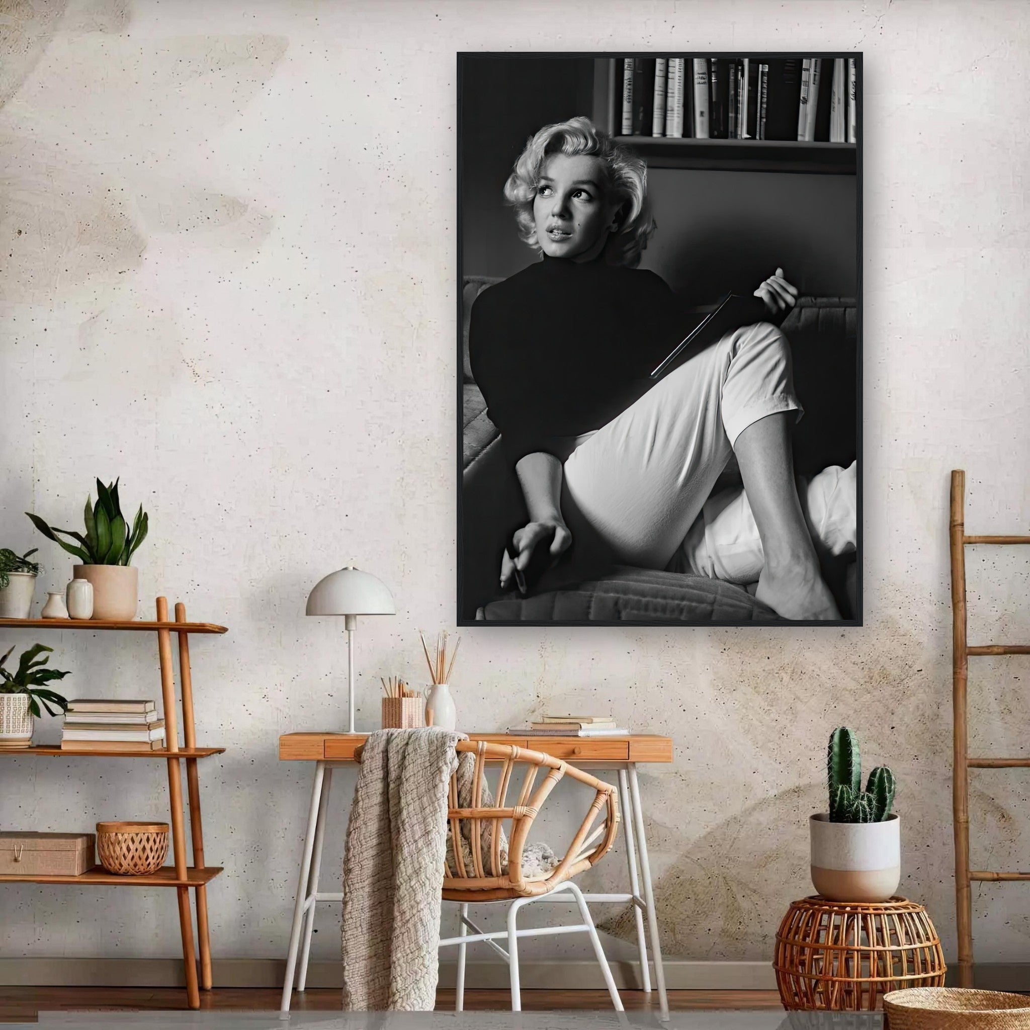 Marilyn Monroe reading a book in elegant black-and-white framed print, perfect for home or office decor.