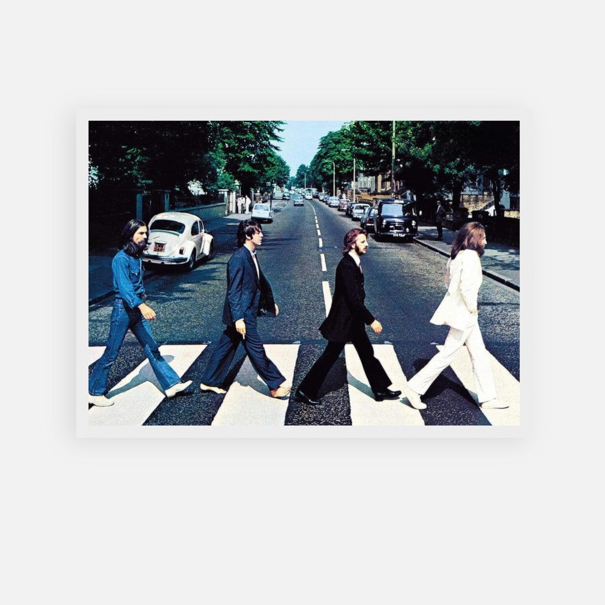 The Beatles Abbey Road framed print featuring iconic crossing image of the band on a zebra crossing.