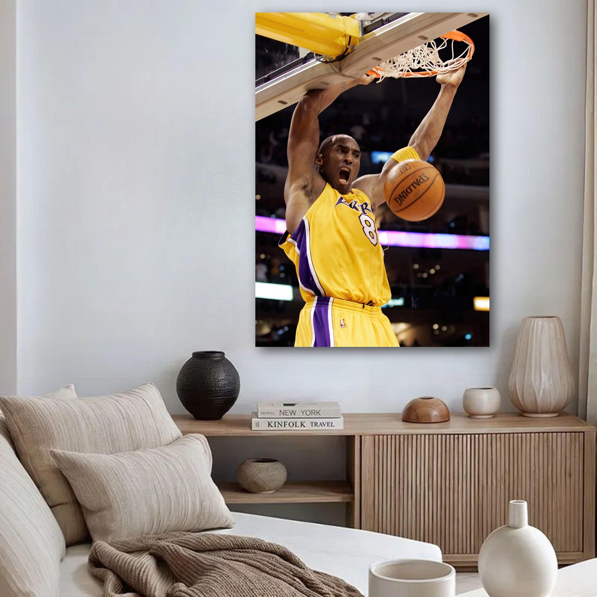Kobe Bryant's iconic slam dunk poster featuring him in a yellow Lakers jersey, showcasing his athleticism and passion for basketball.