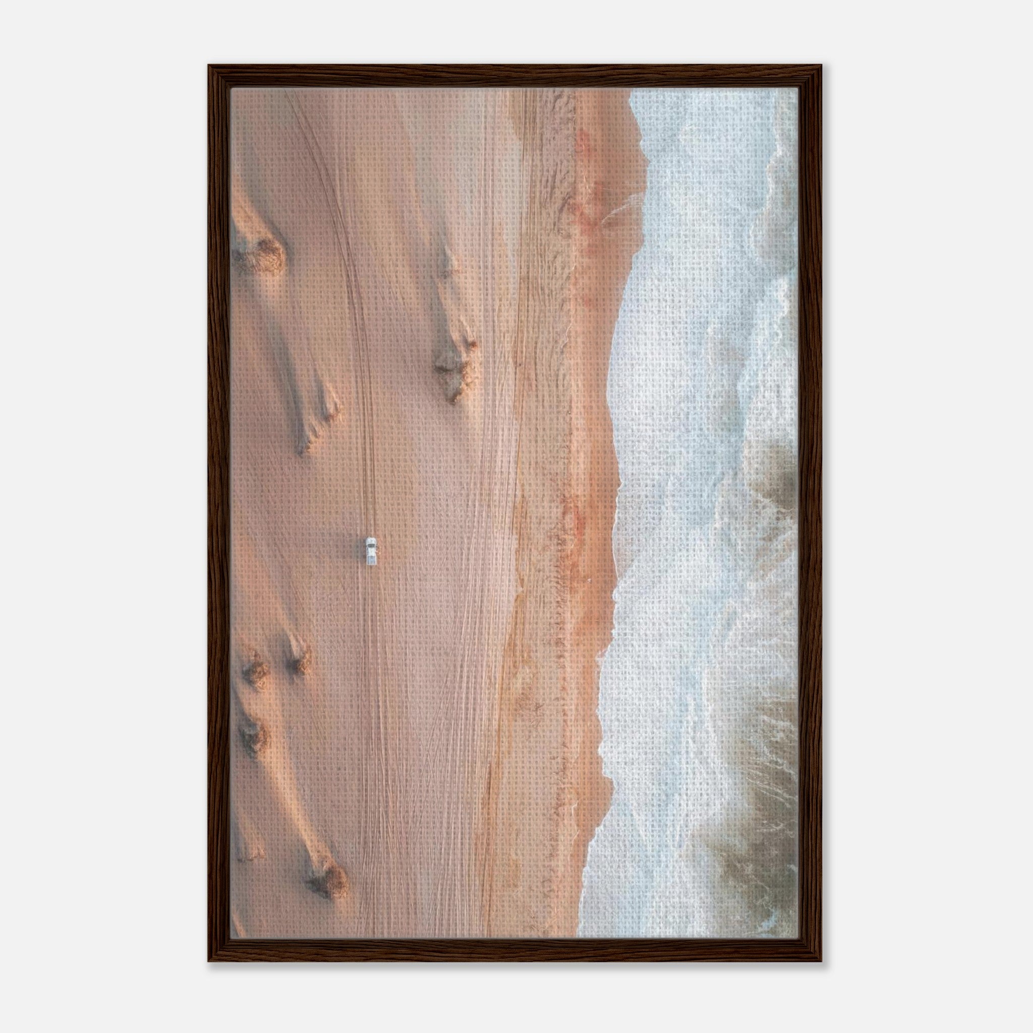 Framed canvas print of aerial drone photography showcasing desert sand dunes meeting the ocean waves.