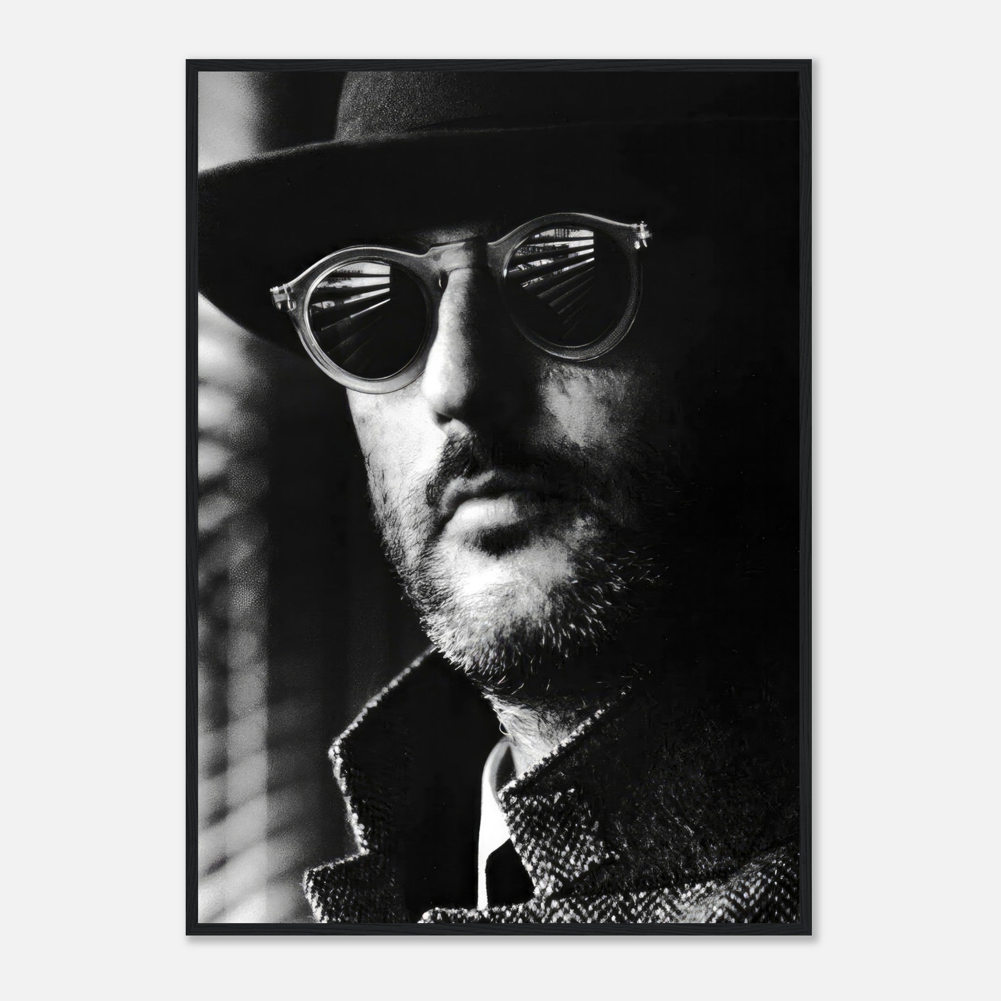 Jean Reno in black-and-white framed print, showcasing elegance and cinematic allure for modern interiors.