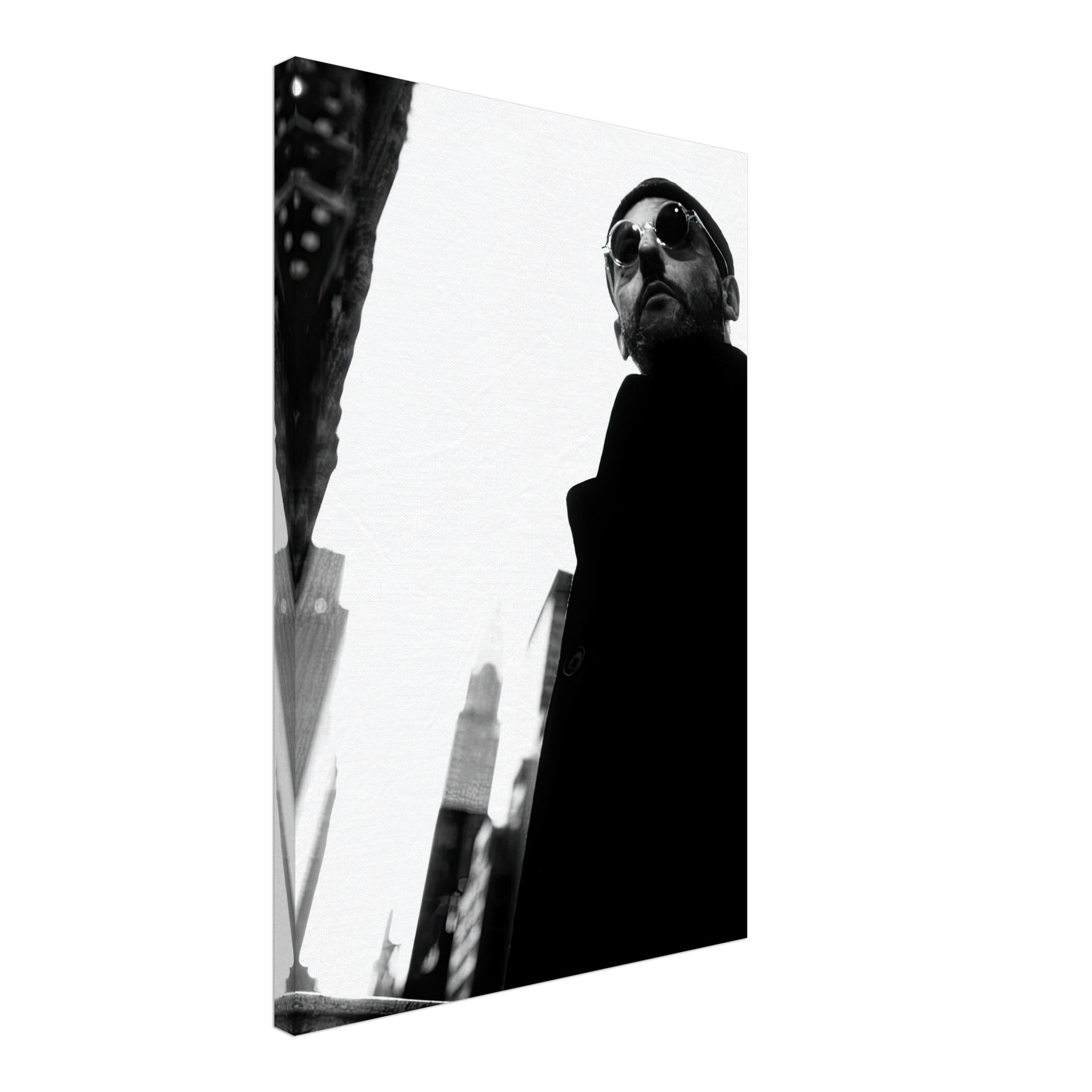 Black-and-white canvas artwork of a man in sunglasses, showcasing urban architecture and sophistication.