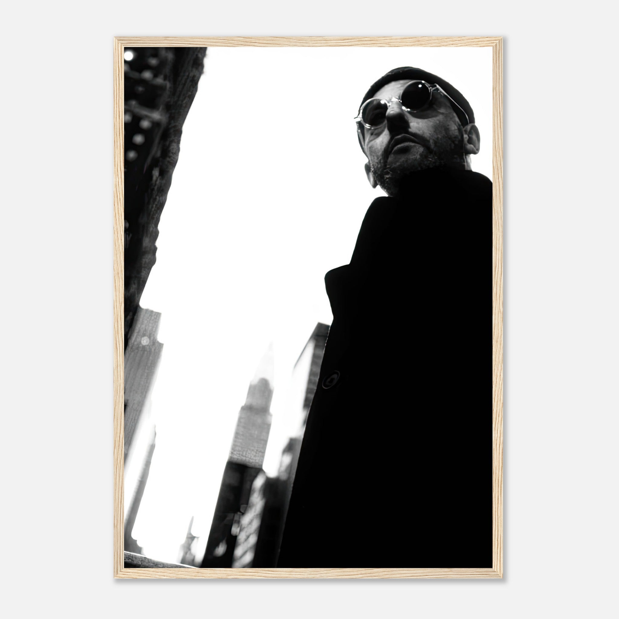 Leon Photography - Jean Reno framed print featuring iconic black-and-white urban portraiture.