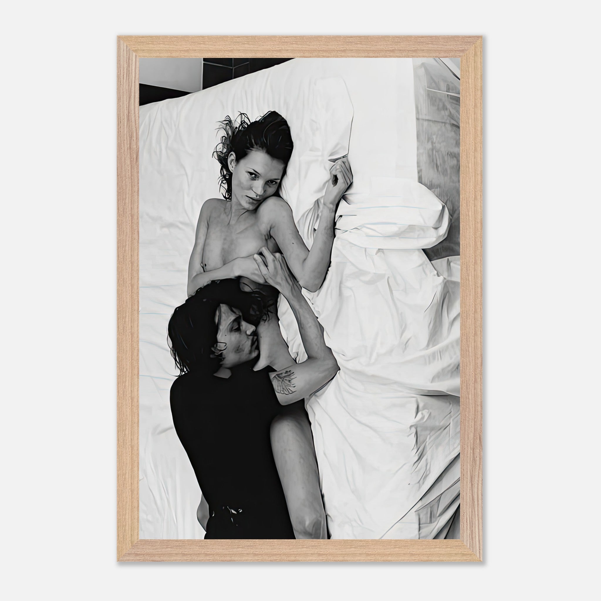 Black and white fine art print of Kate Moss and Johnny Depp in an intimate pose, photographed in 1994 by Annie Leibovitz.