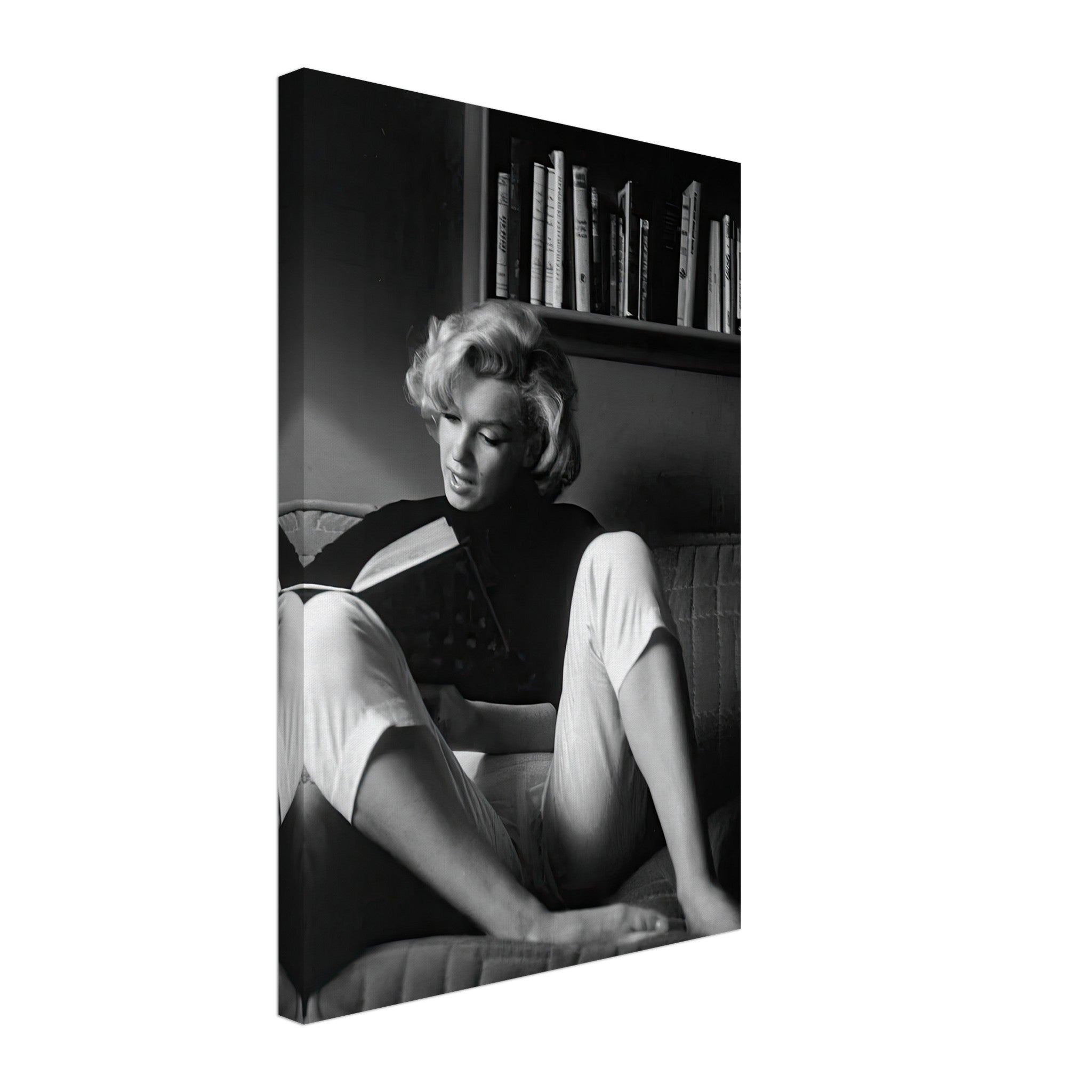 Marilyn Monroe reading at home, black-and-white canvas art showcasing elegance and Hollywood glamour.