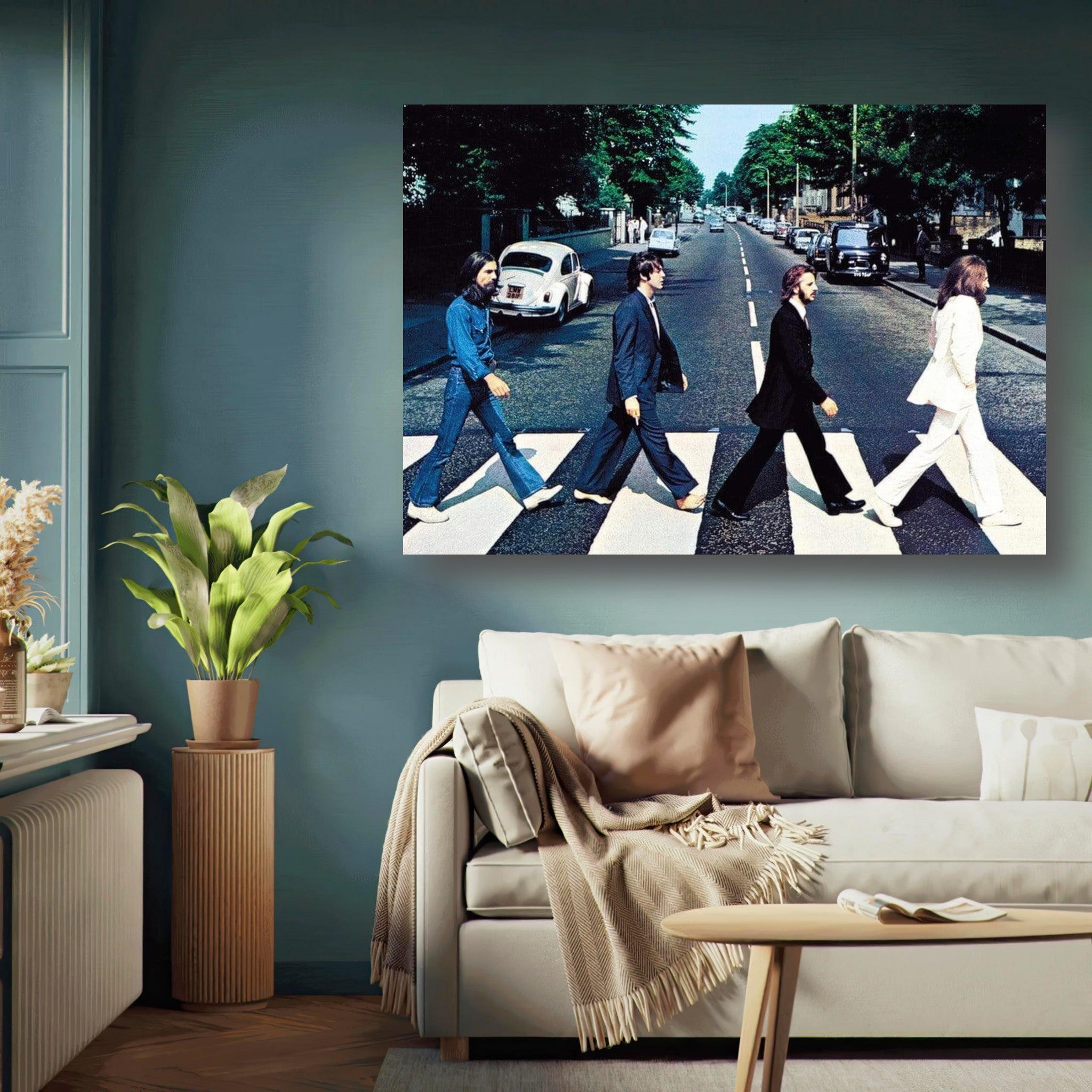 The Beatles Abbey Road metal print displayed in a modern living room setting, featuring iconic crosswalk scene.