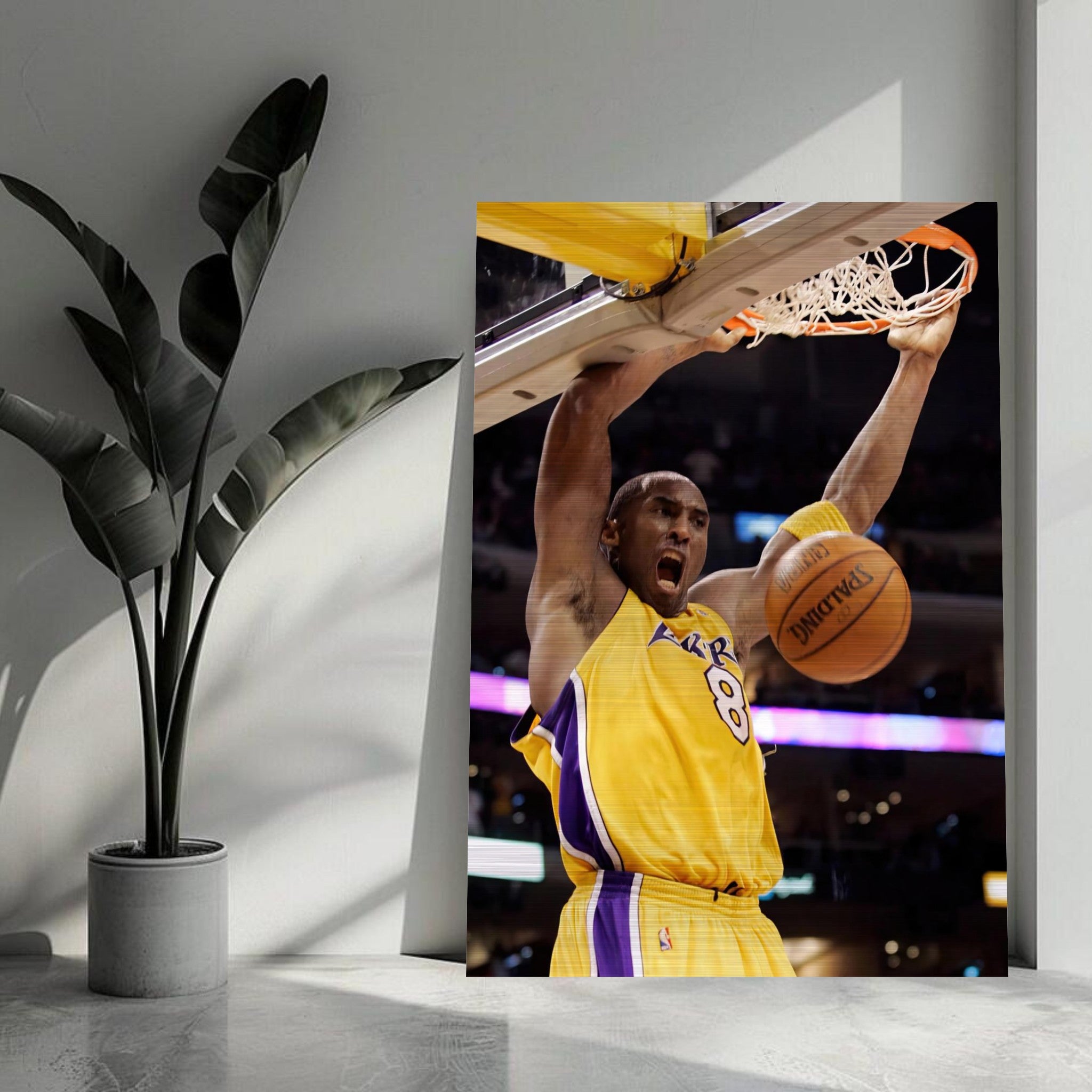 Kobe Bryant mid-air slam dunk in Lakers jersey, showcasing his incredible athleticism and passion for basketball.