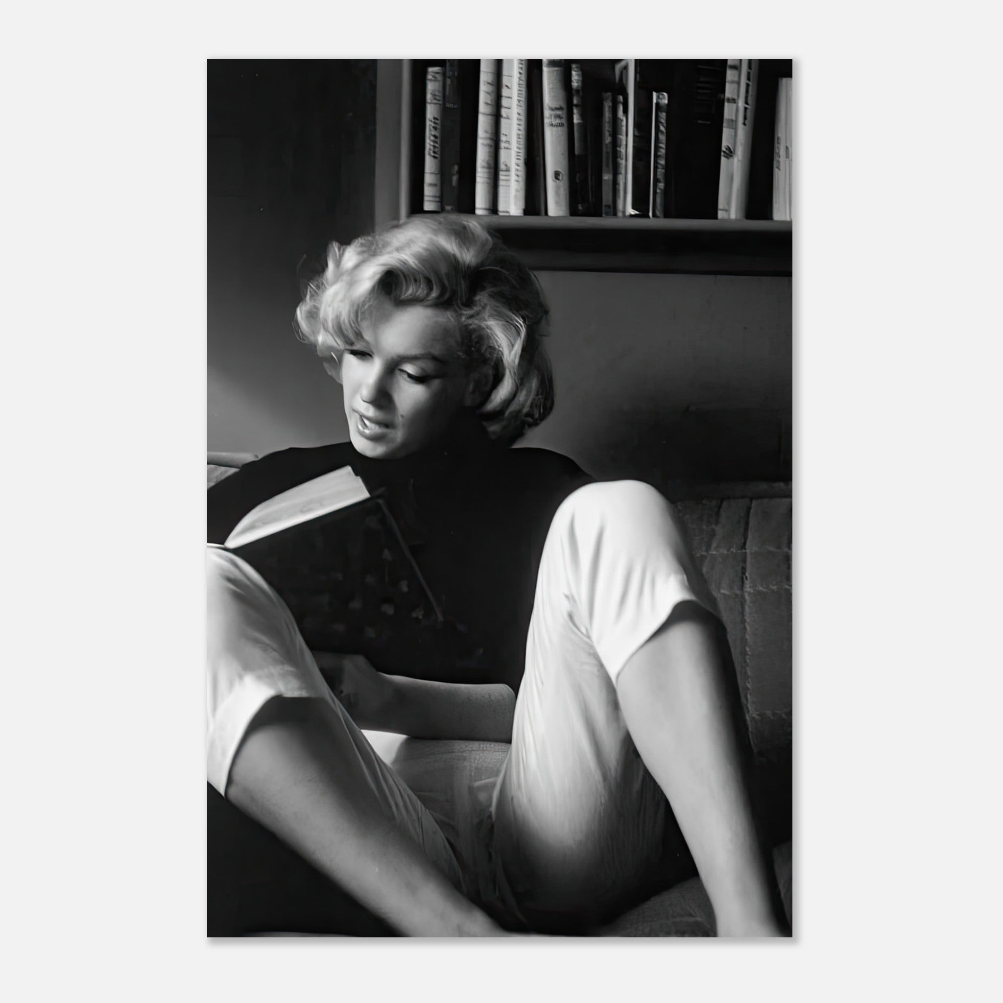 Marilyn Monroe reading at home, stylish metal print capturing her elegance in black-and-white.