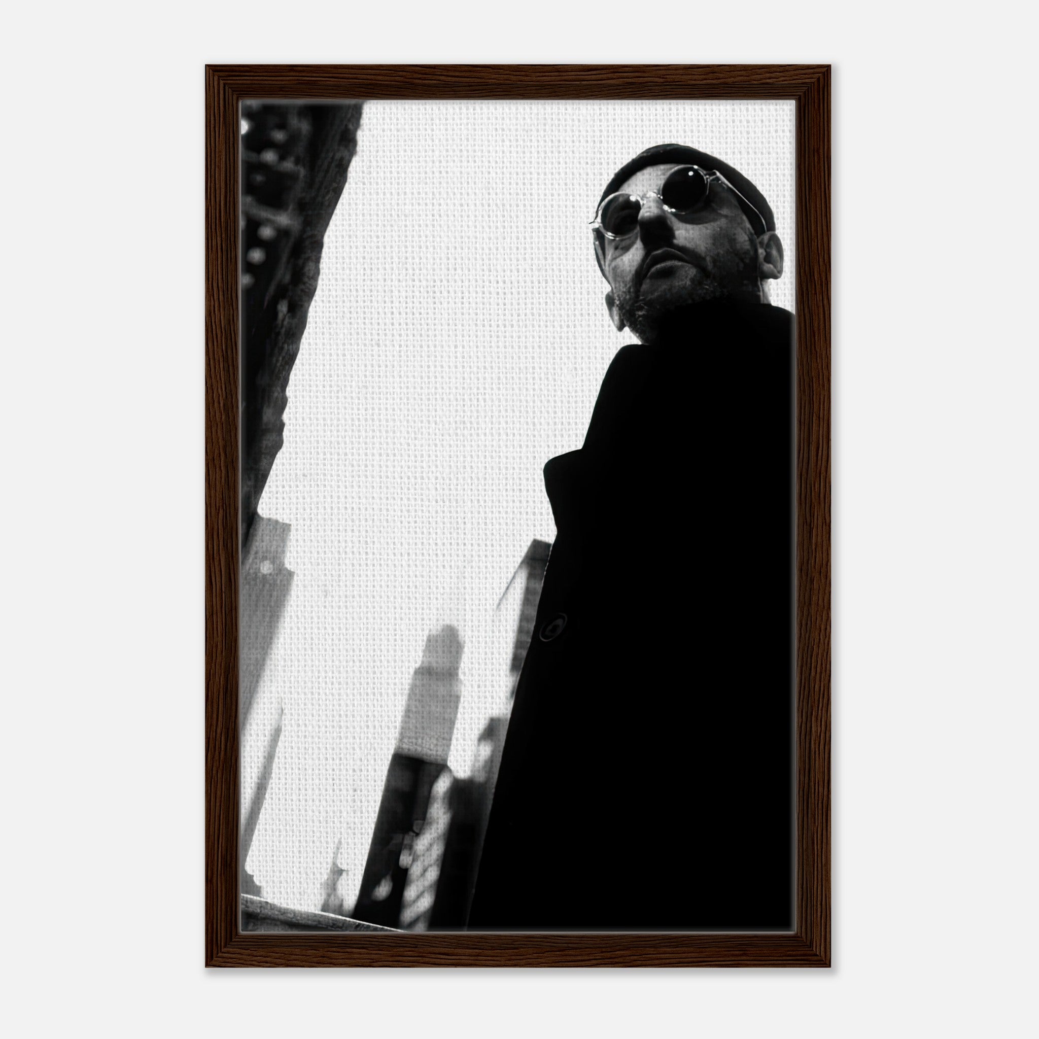 Black-and-white canvas print of a stylish figure wearing sunglasses in an urban setting, framed for home or office decor.
