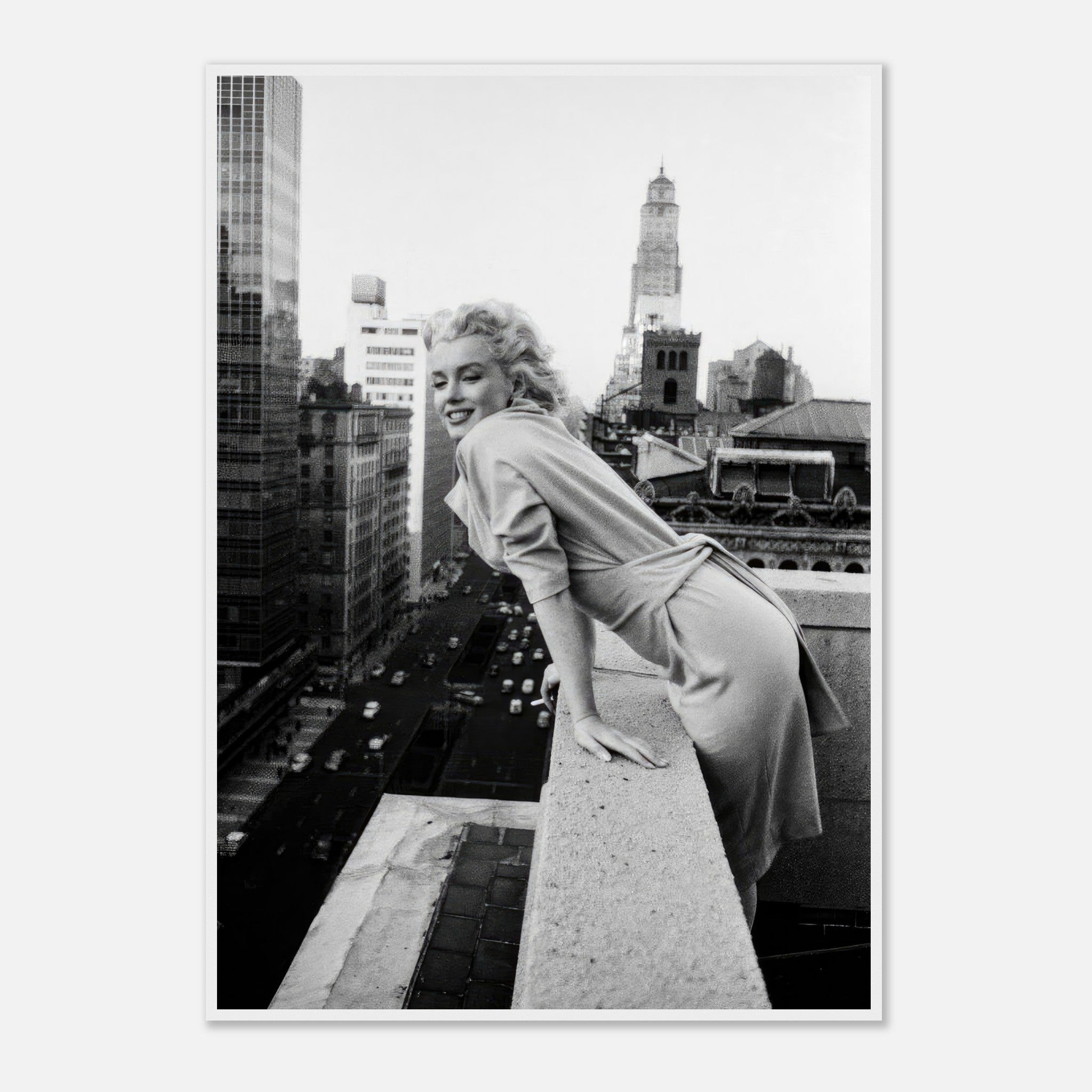 Marilyn Monroe on rooftop in New York City, smiling in iconic black-and-white framed print from the 1950s.