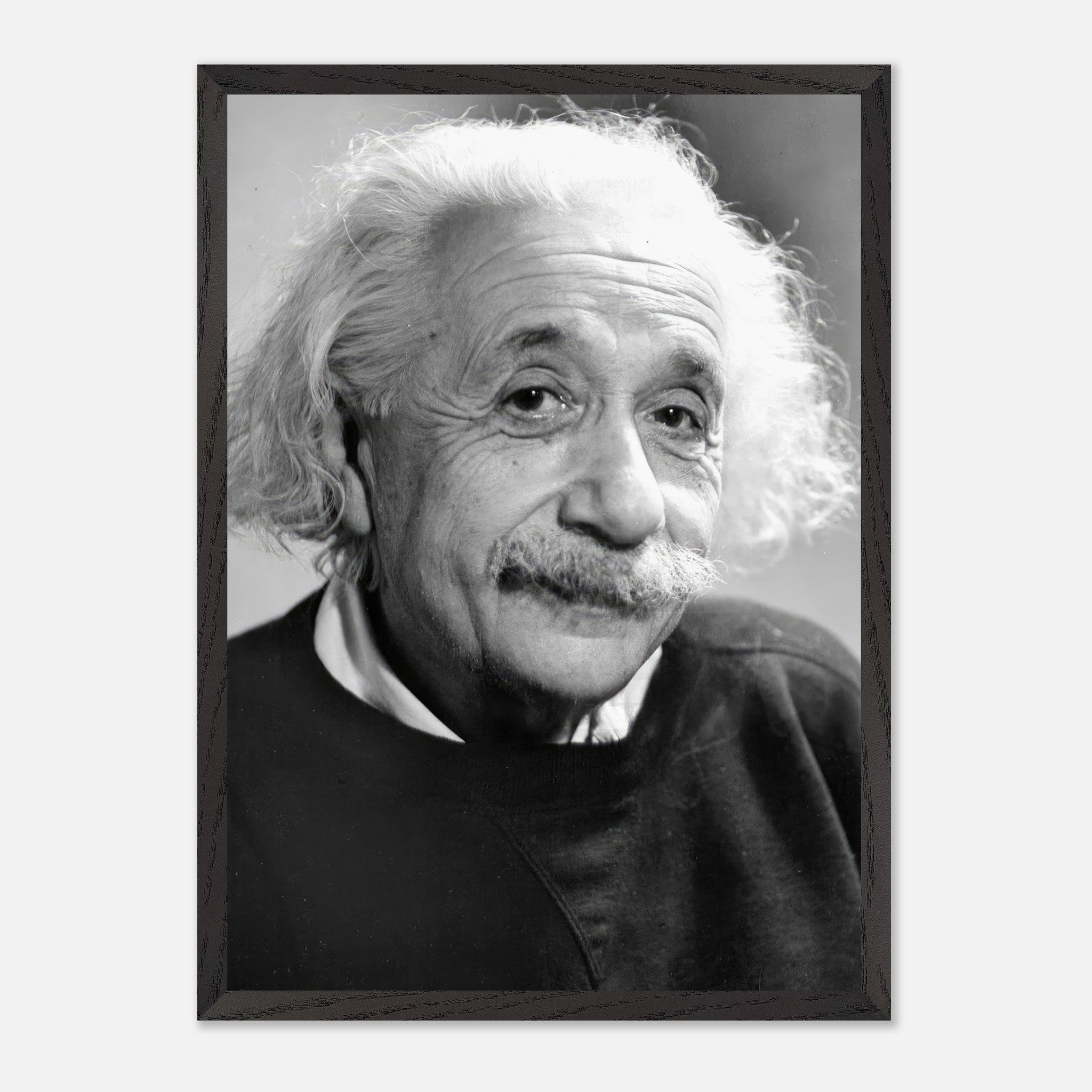 Vintage framed print of Albert Einstein from 1946, showcasing his warm expression and legendary persona.