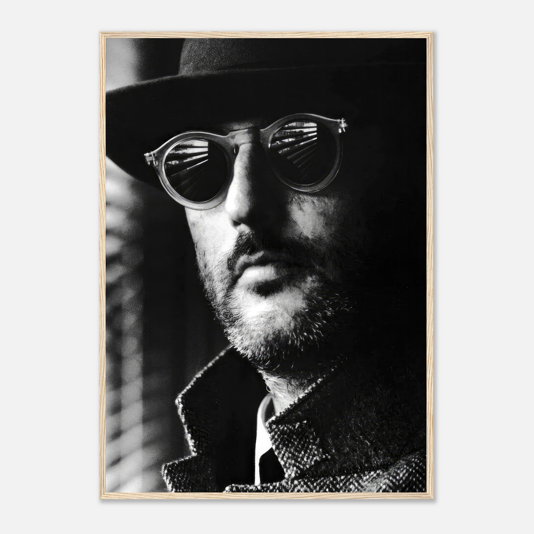 Black-and-white framed print of Jean Reno as Leon, showcasing sophistication and cinematic allure.