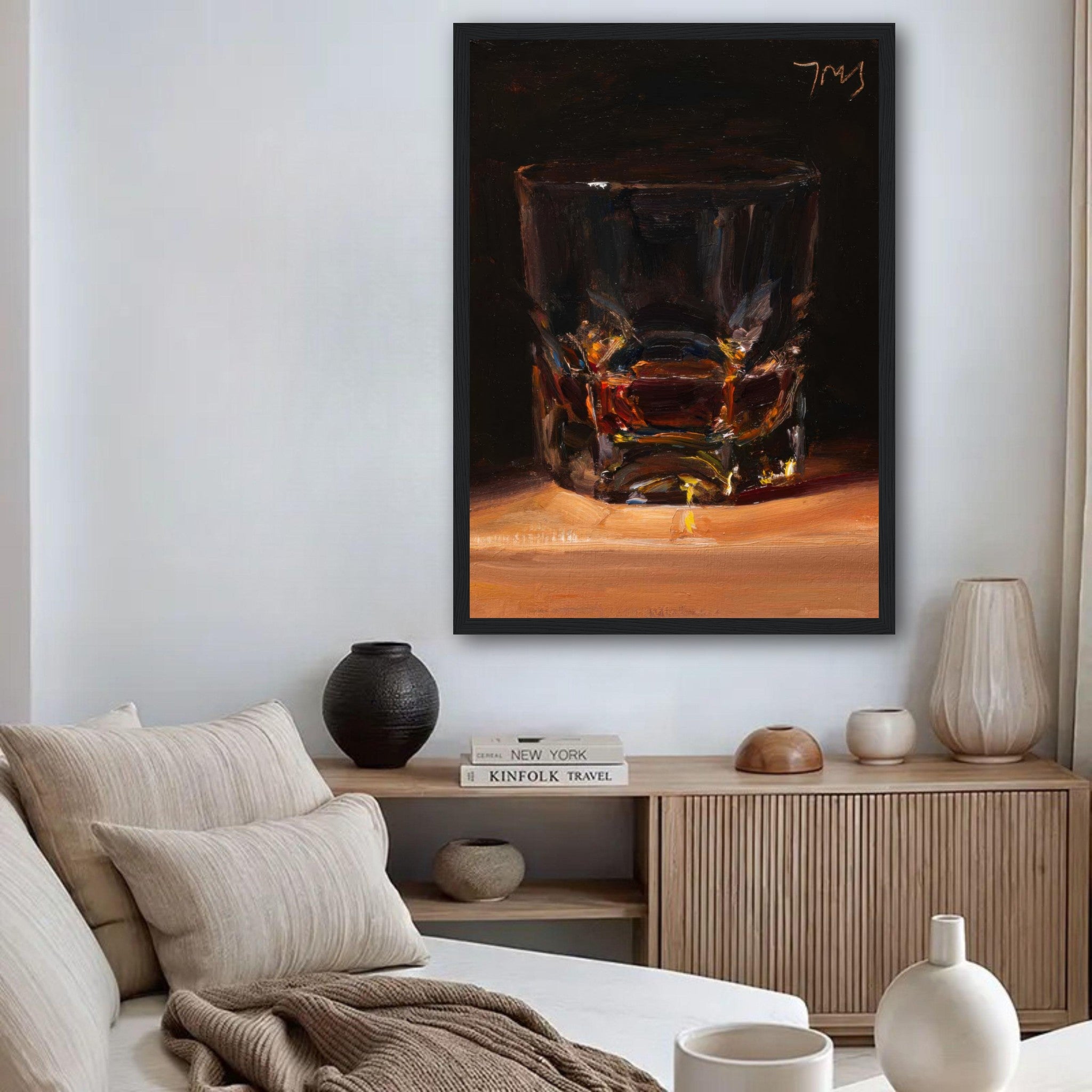 Whiskey framed print showcasing a glass of whiskey, enhancing upscale home decor in a modern living space.