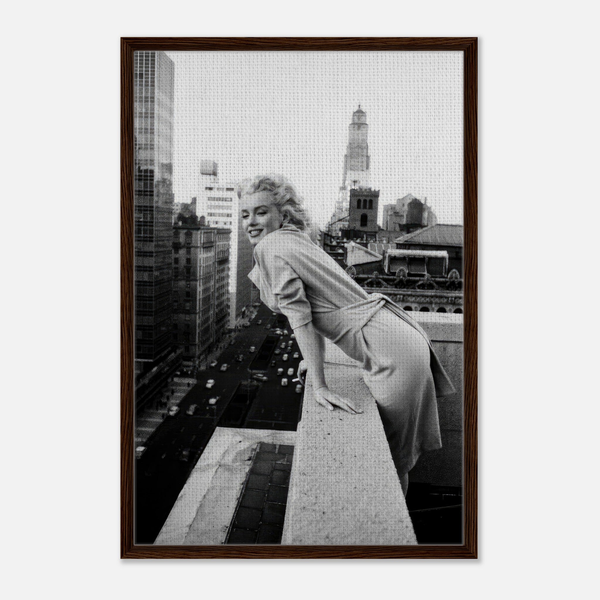 Marilyn Monroe smiling on a rooftop in New York City, captured in an elegant black-and-white framed canvas print.