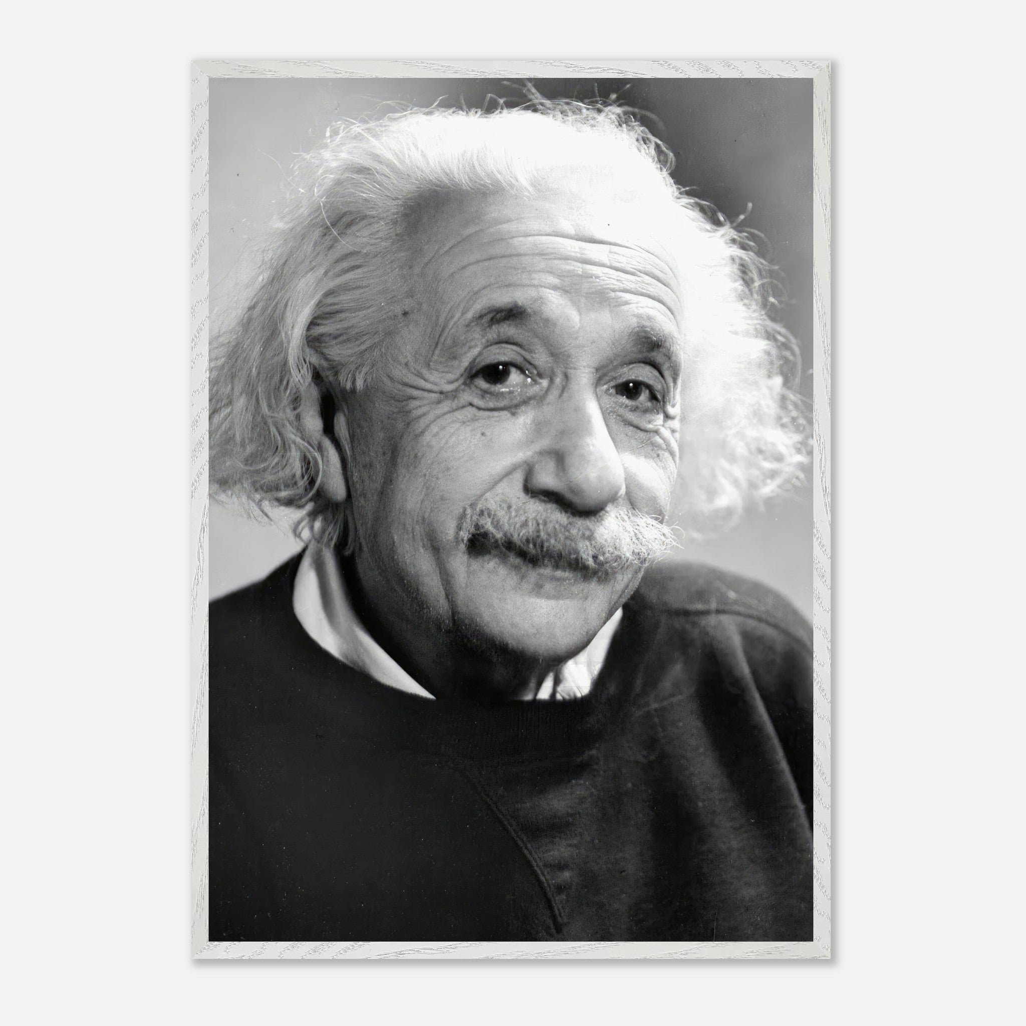 Vintage framed print of Albert Einstein from 1946, capturing his warm expression in black-and-white.