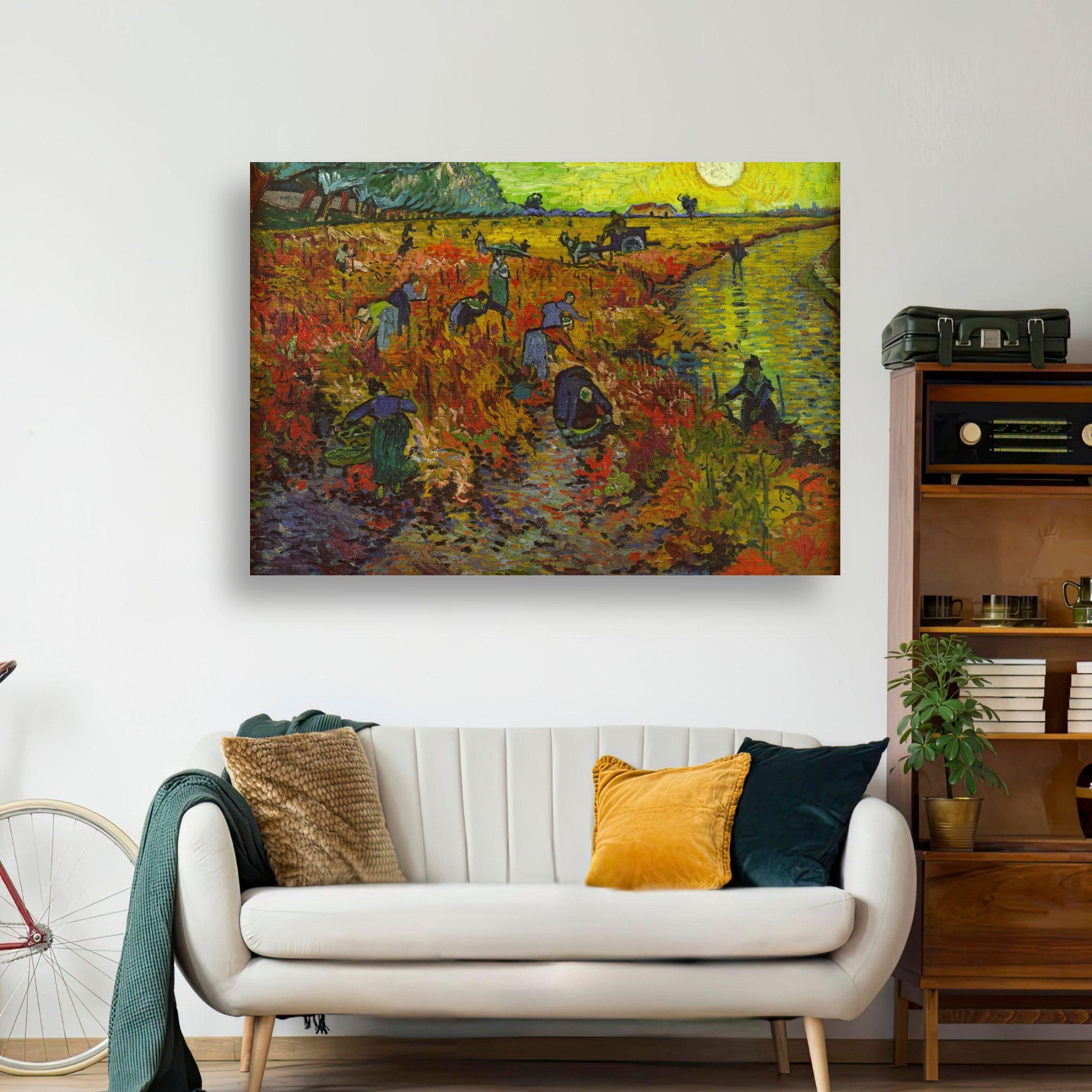 The Red Vineyard by Van Gogh on brushed metal, showcasing vibrant autumn colors in a cozy living room setting.