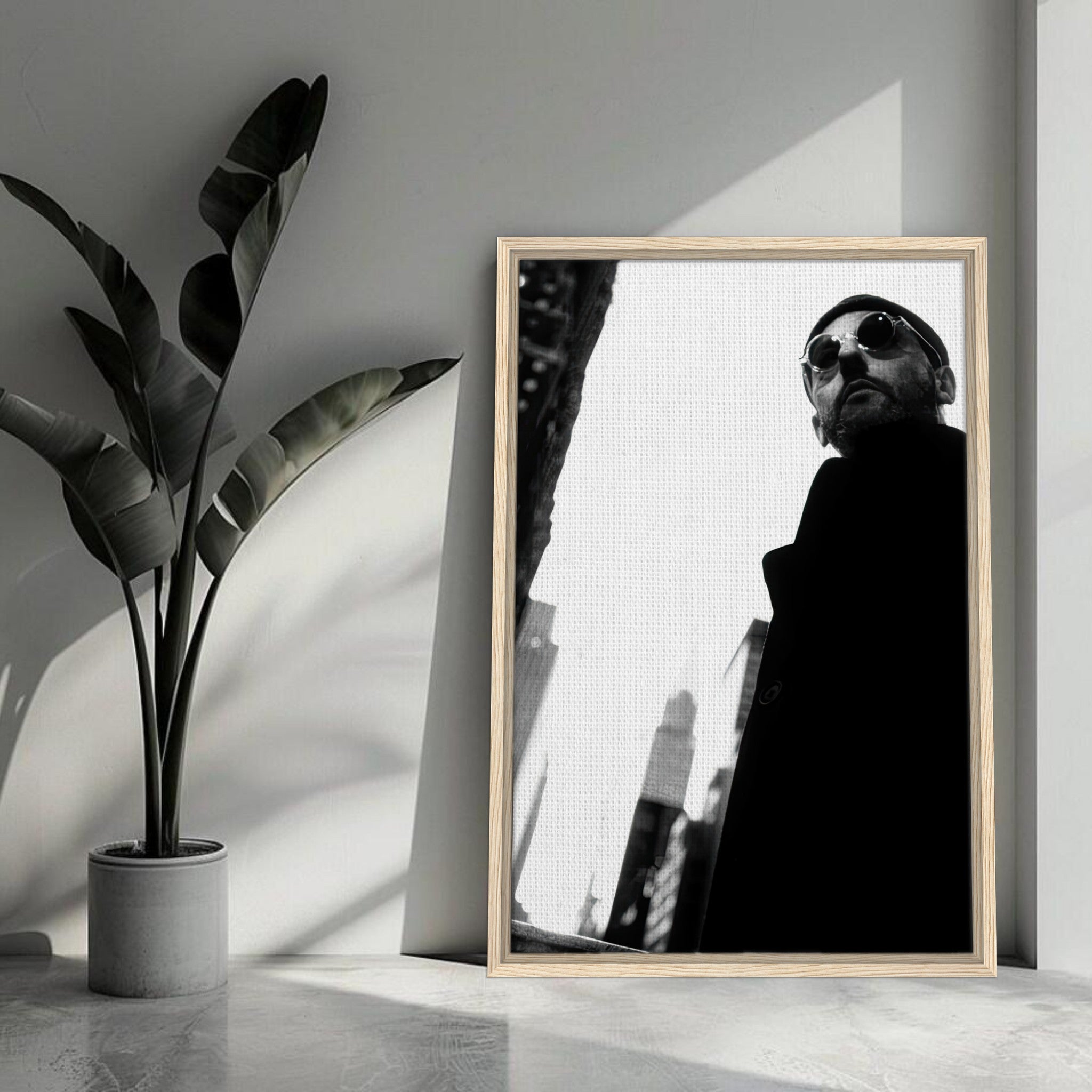 Leon Photography Jean Reno black-and-white framed canvas print in modern decor setting.