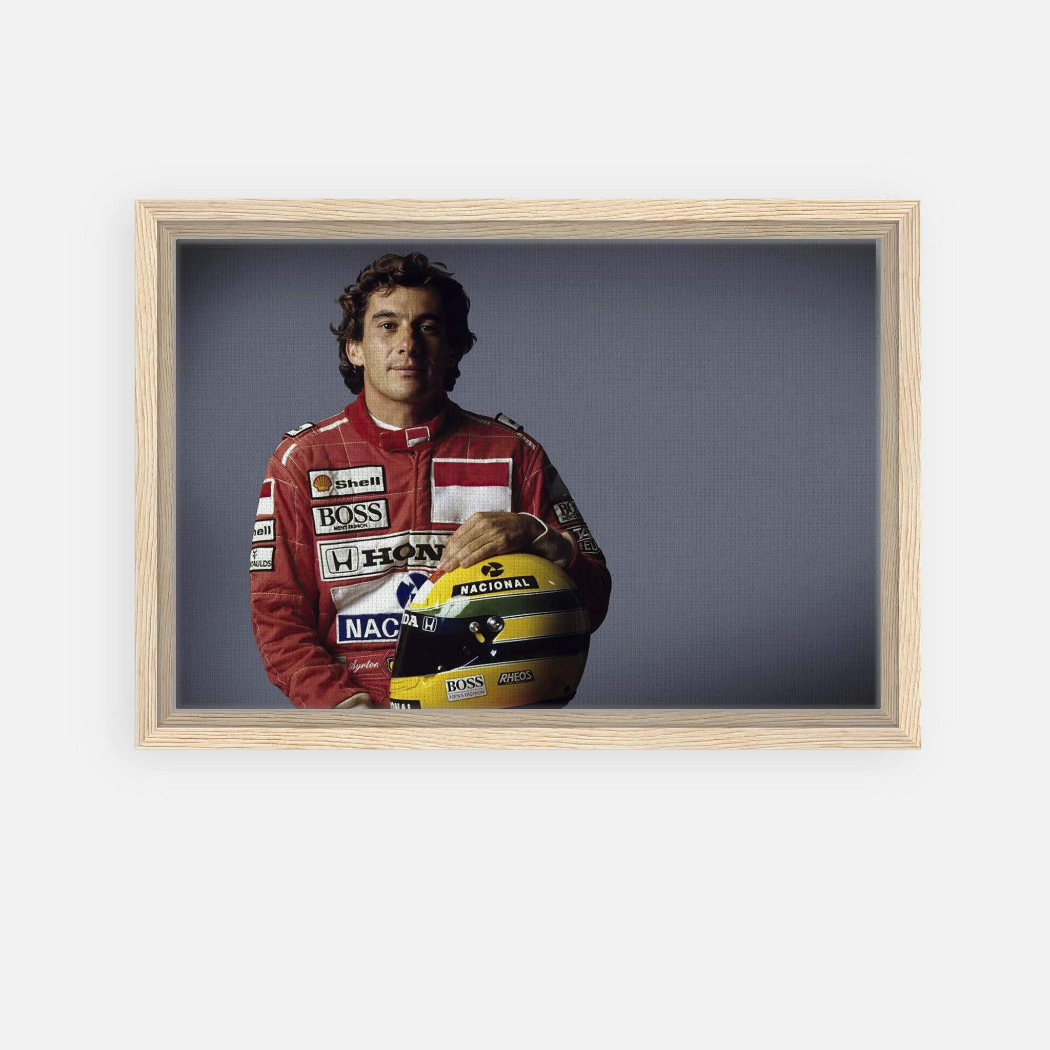 Ayrton Senna framed canvas print, showcasing a motorsport legend in a striking portrait with his helmet.