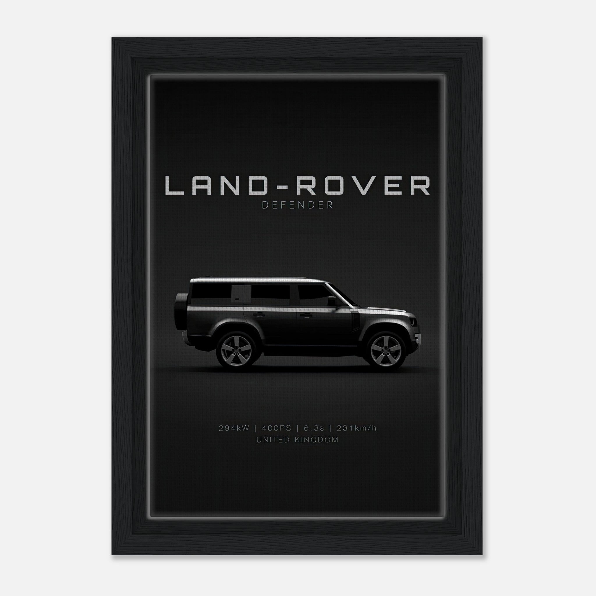 Framed canvas print of Land Rover Defender side profile on black backdrop, showcasing style and sophistication.