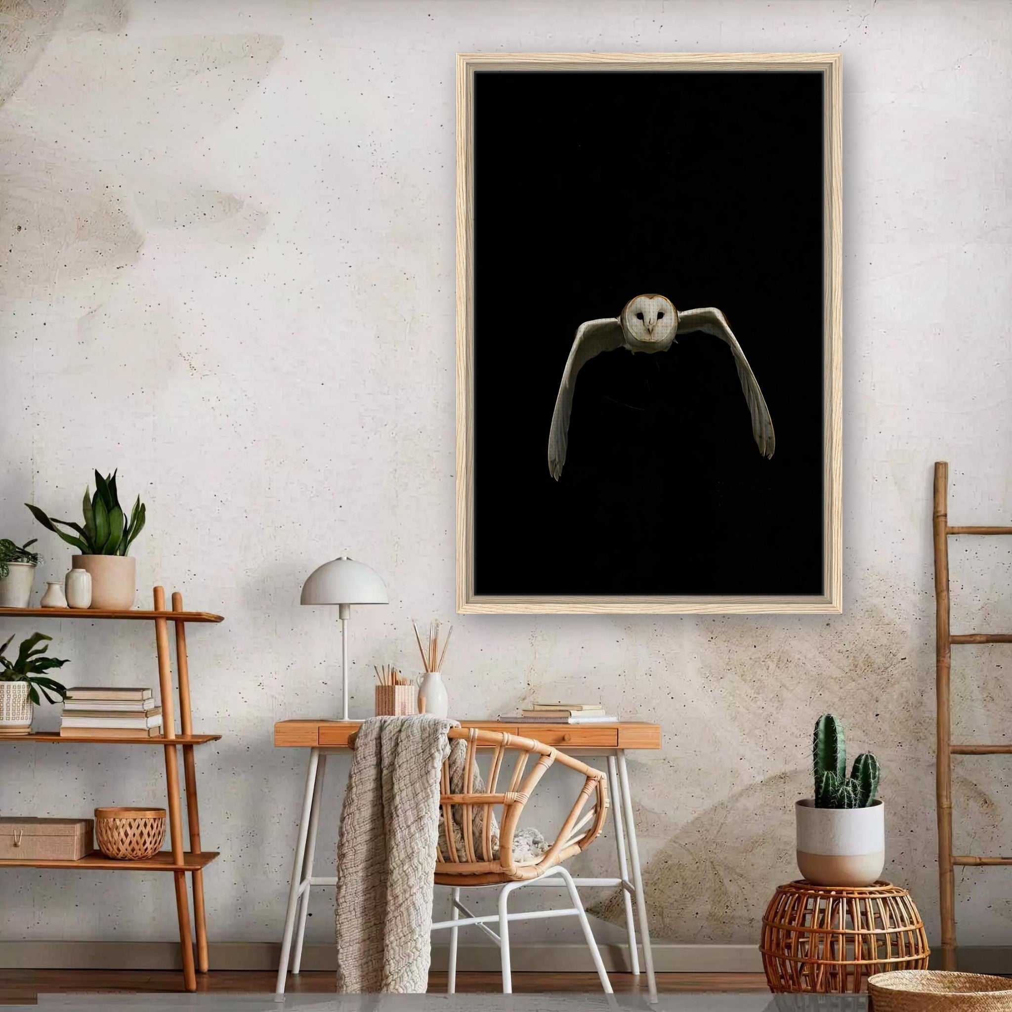 Owl framed canvas artwork in a modern interior with black backdrop, showcasing elegance and nature's beauty.