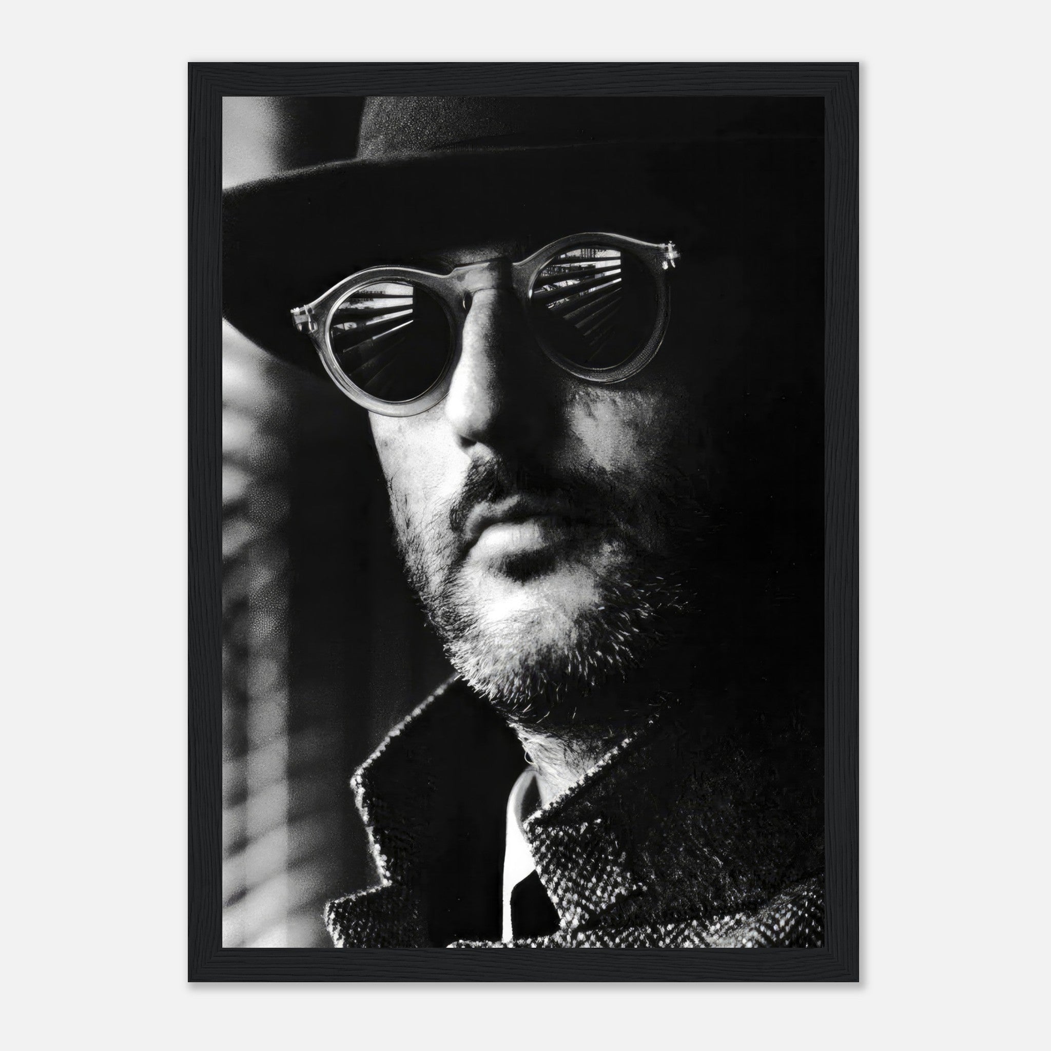 Jean Reno Leon photography framed print, high-quality black-and-white portrait exuding mystery and elegance.