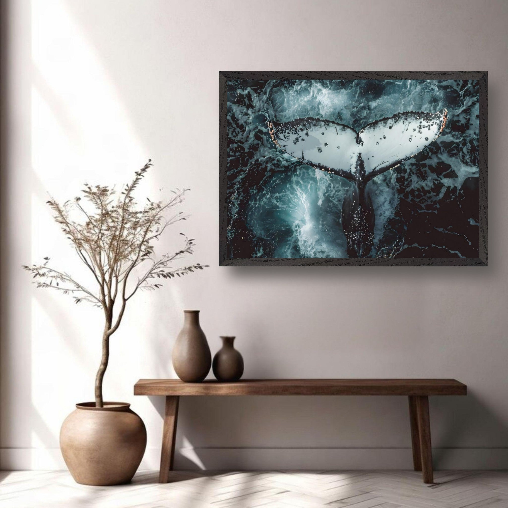 Humpback whale framed art showcasing tail above ocean waves in a stylish living room setting.