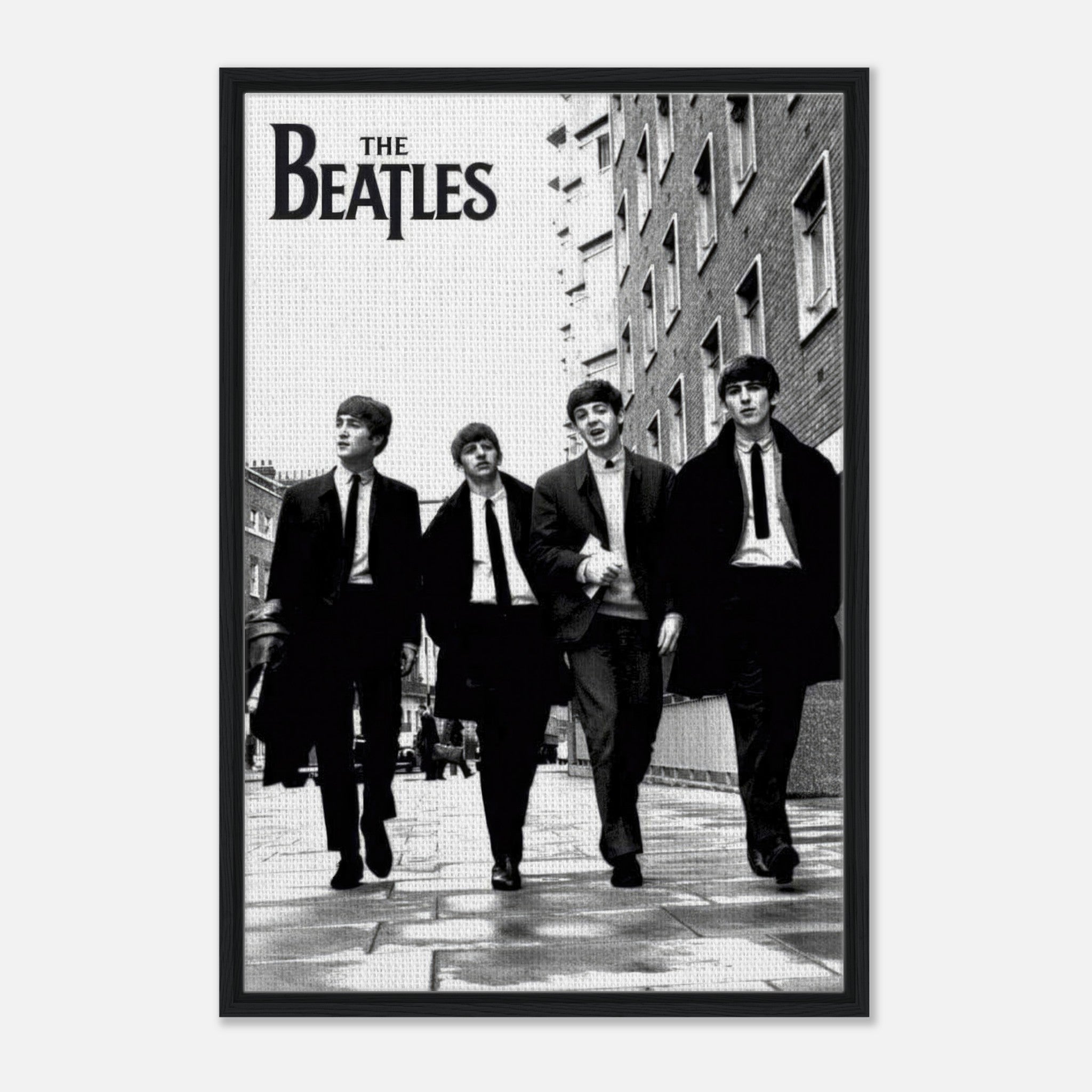 The Beatles cover framed canvas print featuring iconic band members walking in black and white.