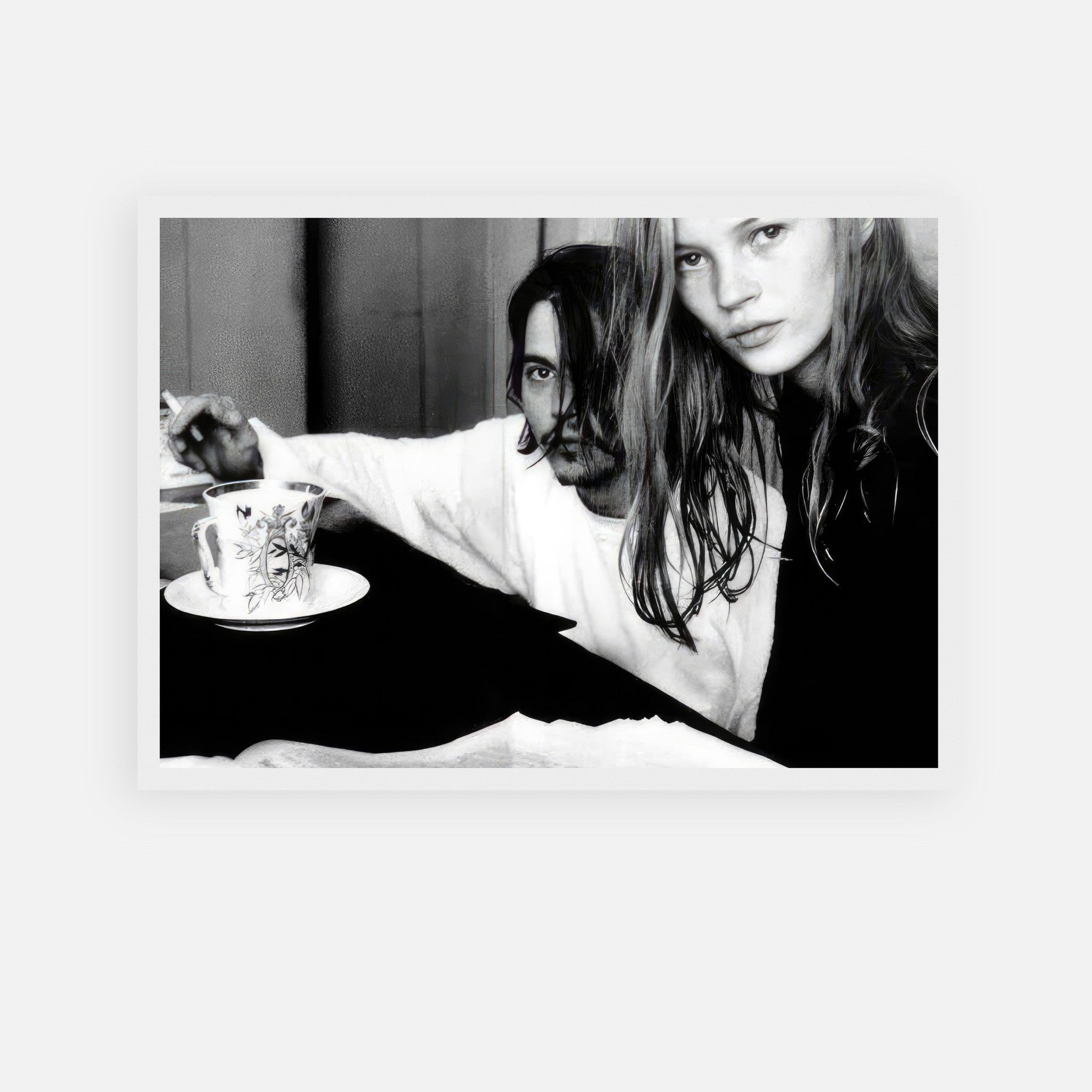 Black-and-white framed print of Johnny Depp and Kate Moss capturing 1990s romance, photographed by François-Marie Banier.