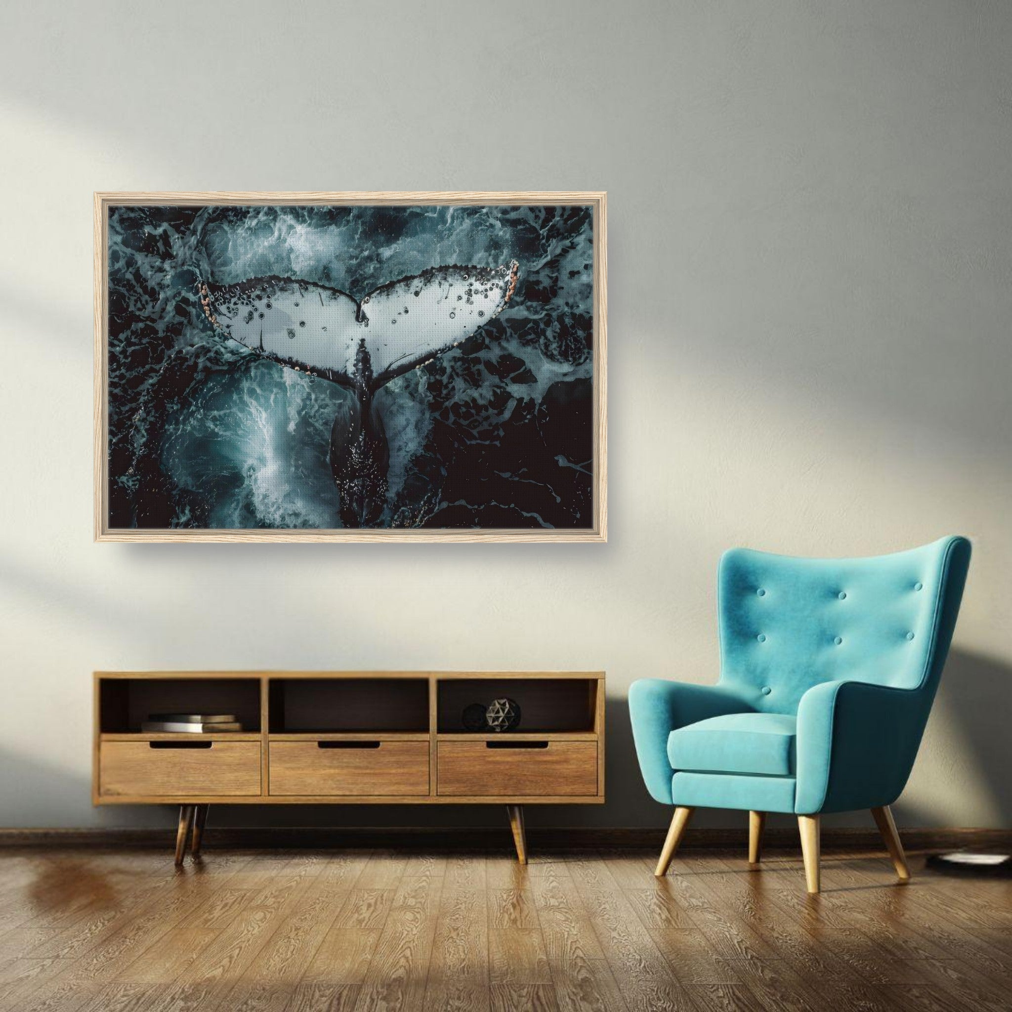 Framed canvas print of a humpback whale's tail breaking the ocean surface, adding elegance to home decor.