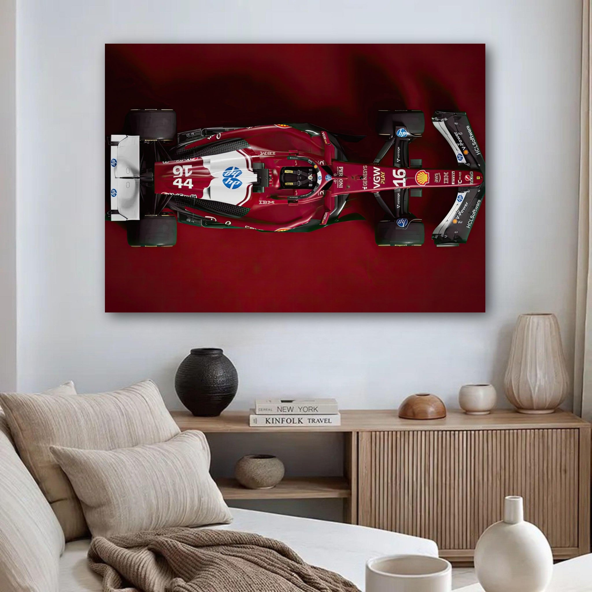 Ferrari F1 2025 poster displayed in a modern living room, highlighting the top-down view of the sleek race car against a red backdrop.