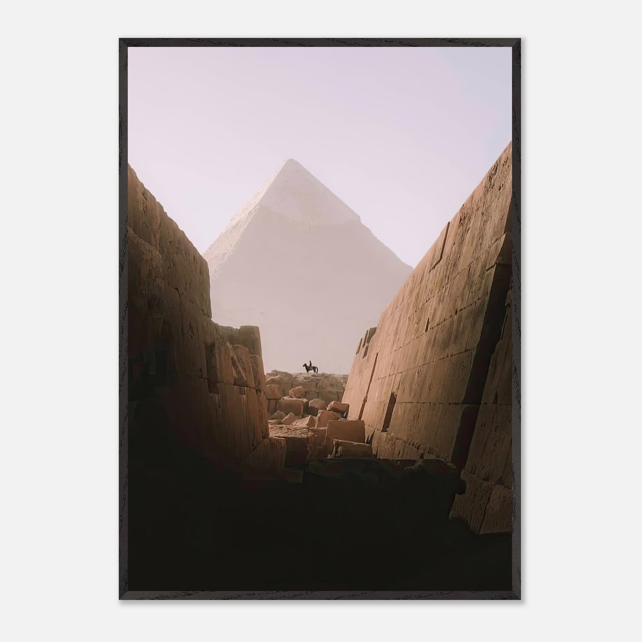 Fine art print of a lone rider against the Great Pyramid of Giza, showcasing historical grandeur and adventure.