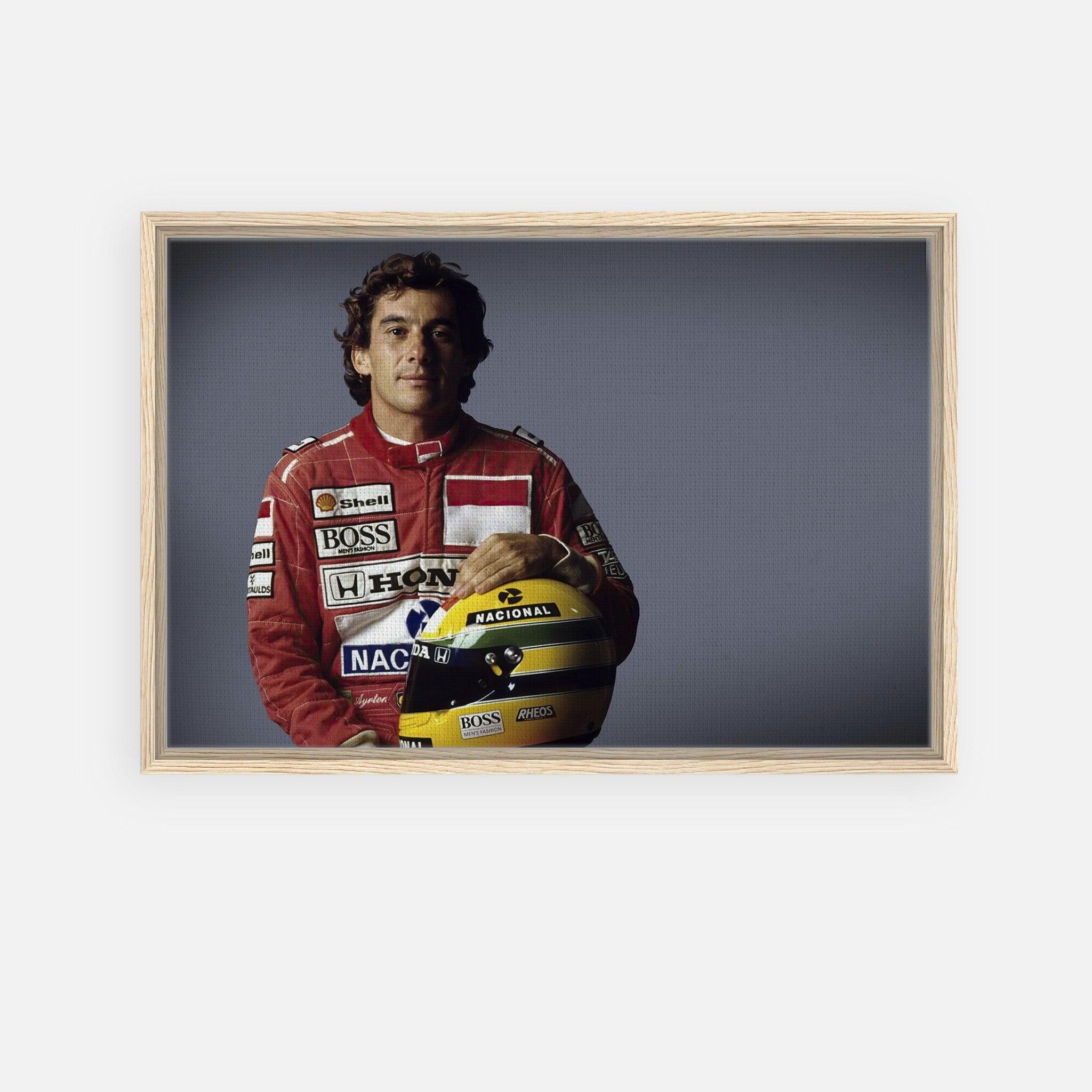 Framed canvas print of Ayrton Senna in racing suit holding helmet, perfect for motorsport enthusiasts.