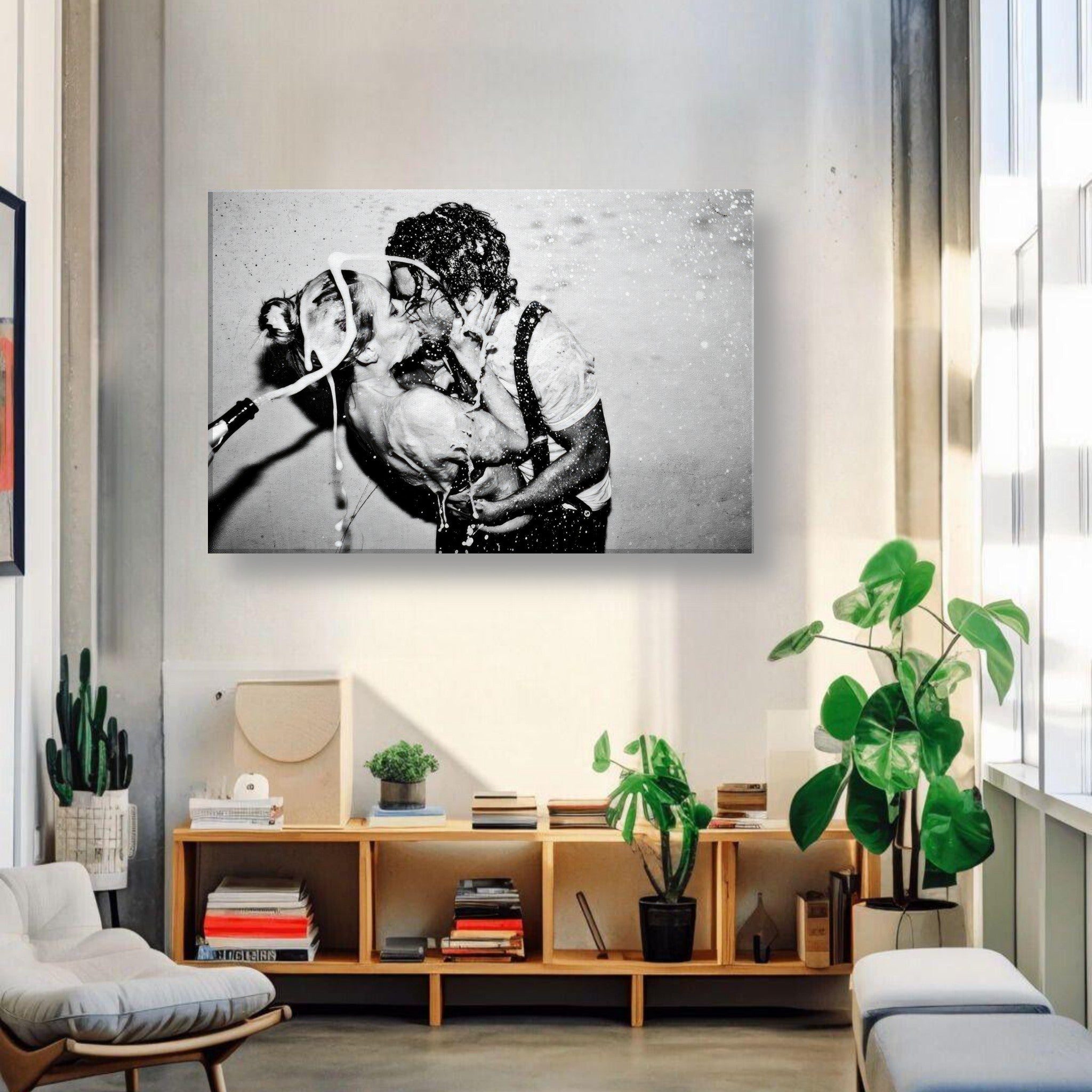 Black-and-white canvas print of Johnny Depp and Kate Moss sharing a passionate kiss in a stylish living room.