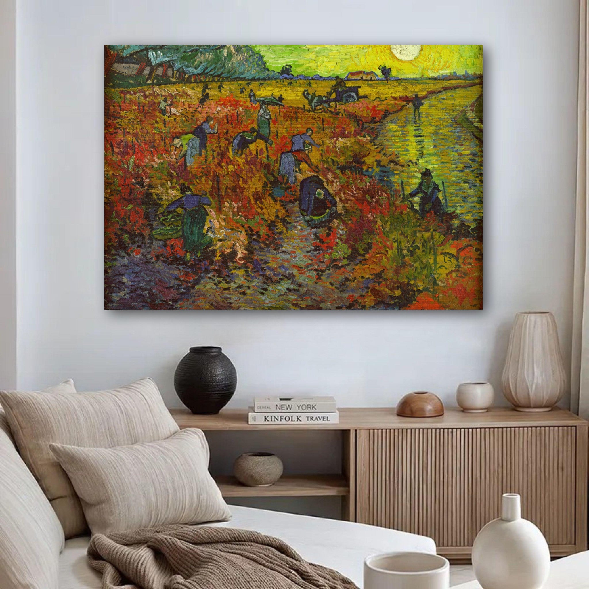 The Red Vineyard by Van Gogh displayed in a modern living room, showcasing vibrant autumn colors and brushed metal finish.