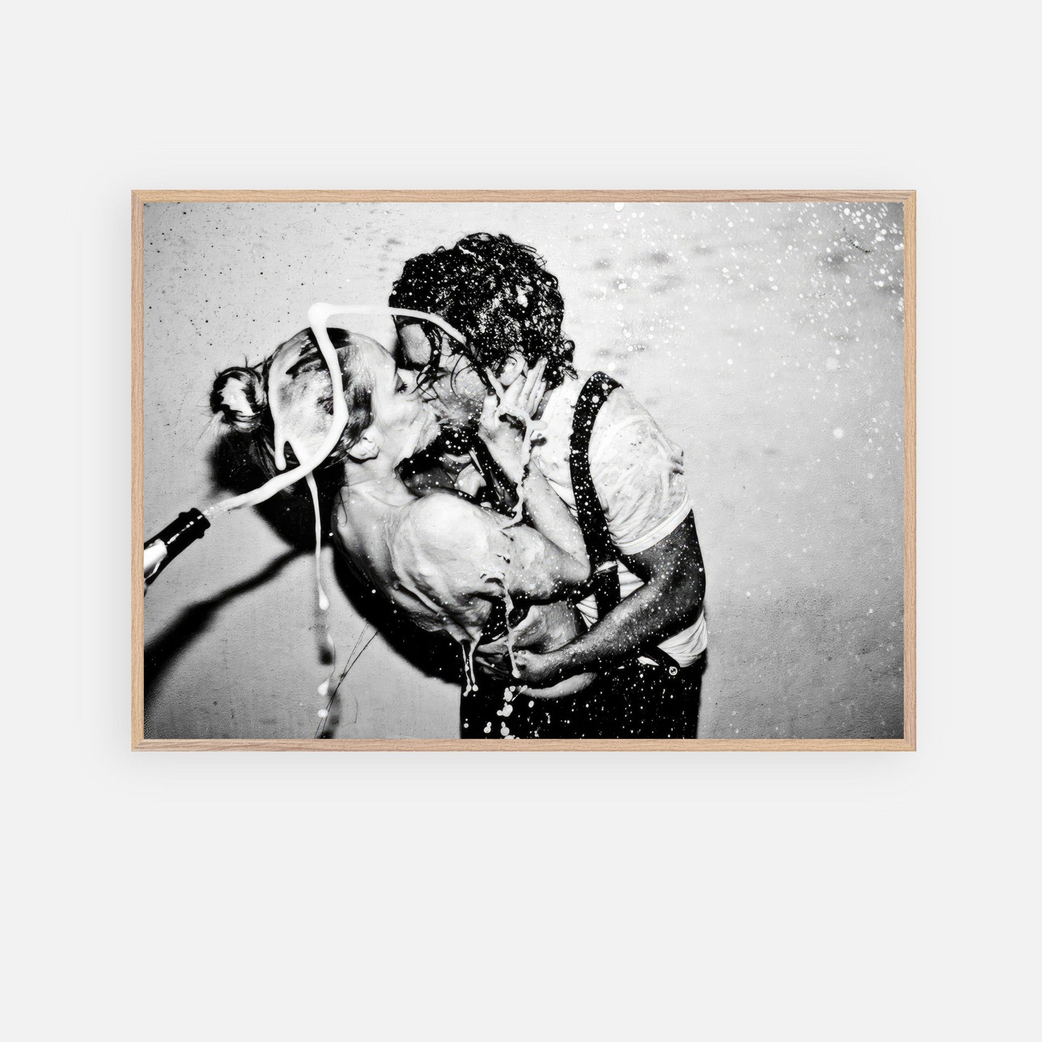 The Champagne Kiss fine art print featuring Johnny Depp and Kate Moss in a romantic black-and-white image.