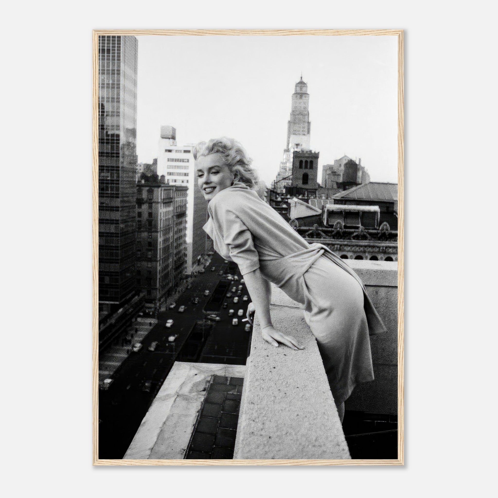 Marilyn Monroe framed print on a rooftop in New York City, showcasing her glamour and charm in black-and-white.