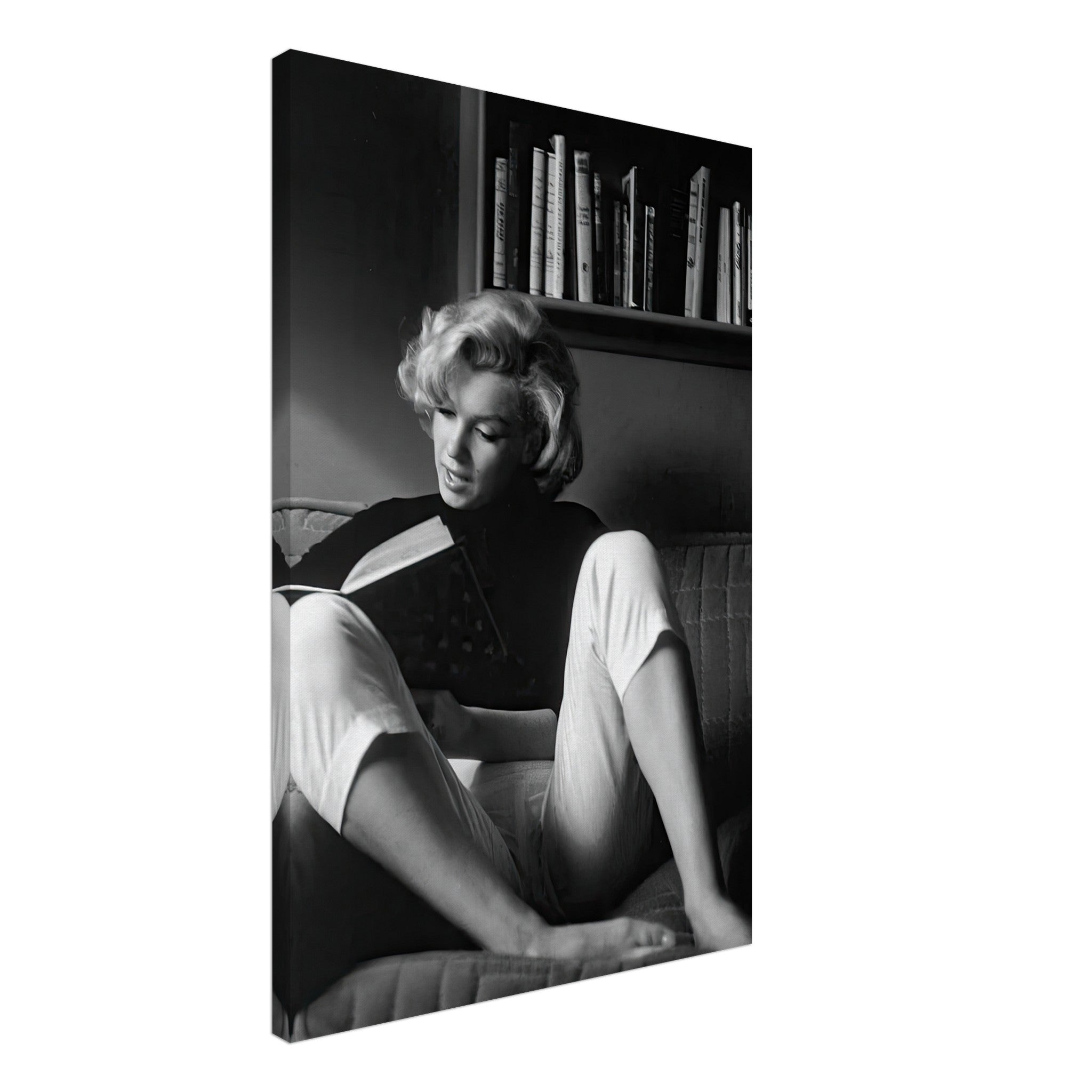 Marilyn Monroe reading at home, captured in stunning black-and-white canvas art, exuding elegance and Hollywood glamour.