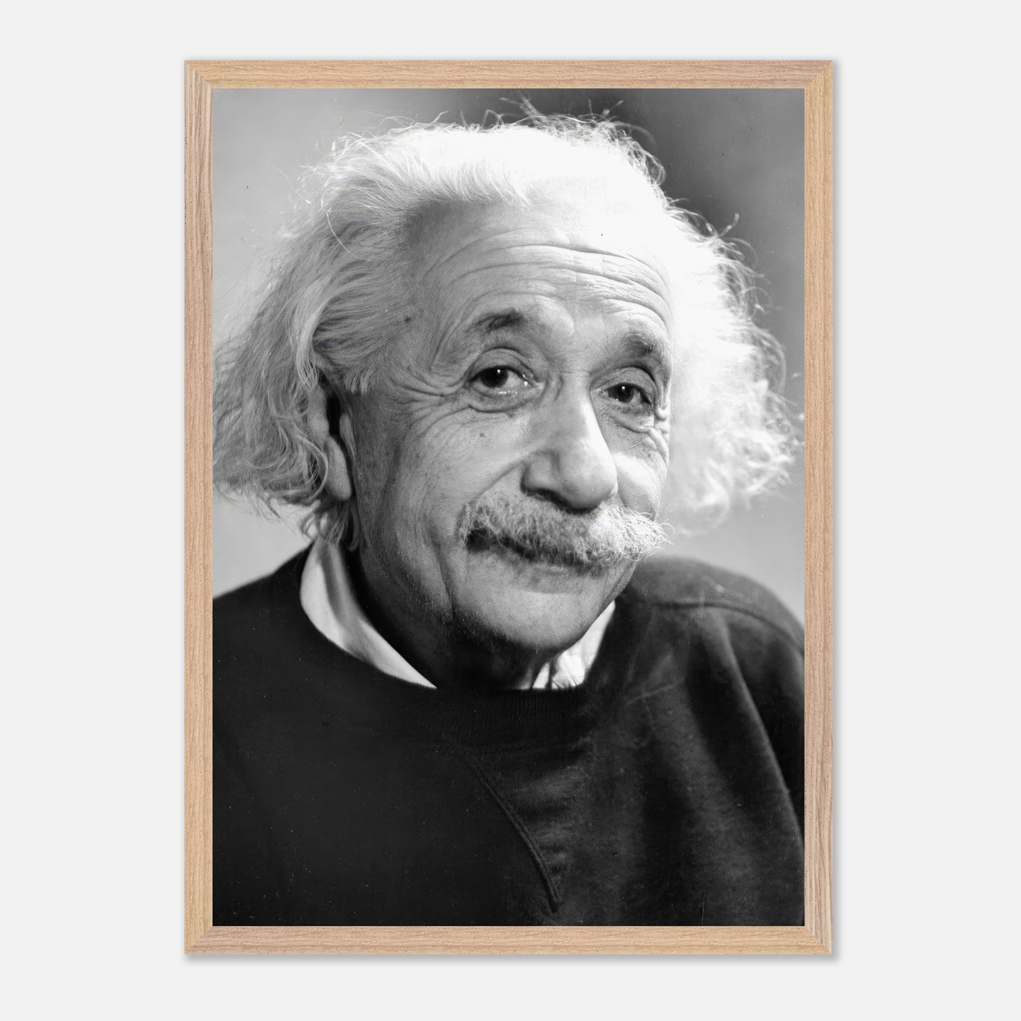 Black-and-white portrait of Albert Einstein, 1946, showcasing his expressive eyes and unique hairstyle.