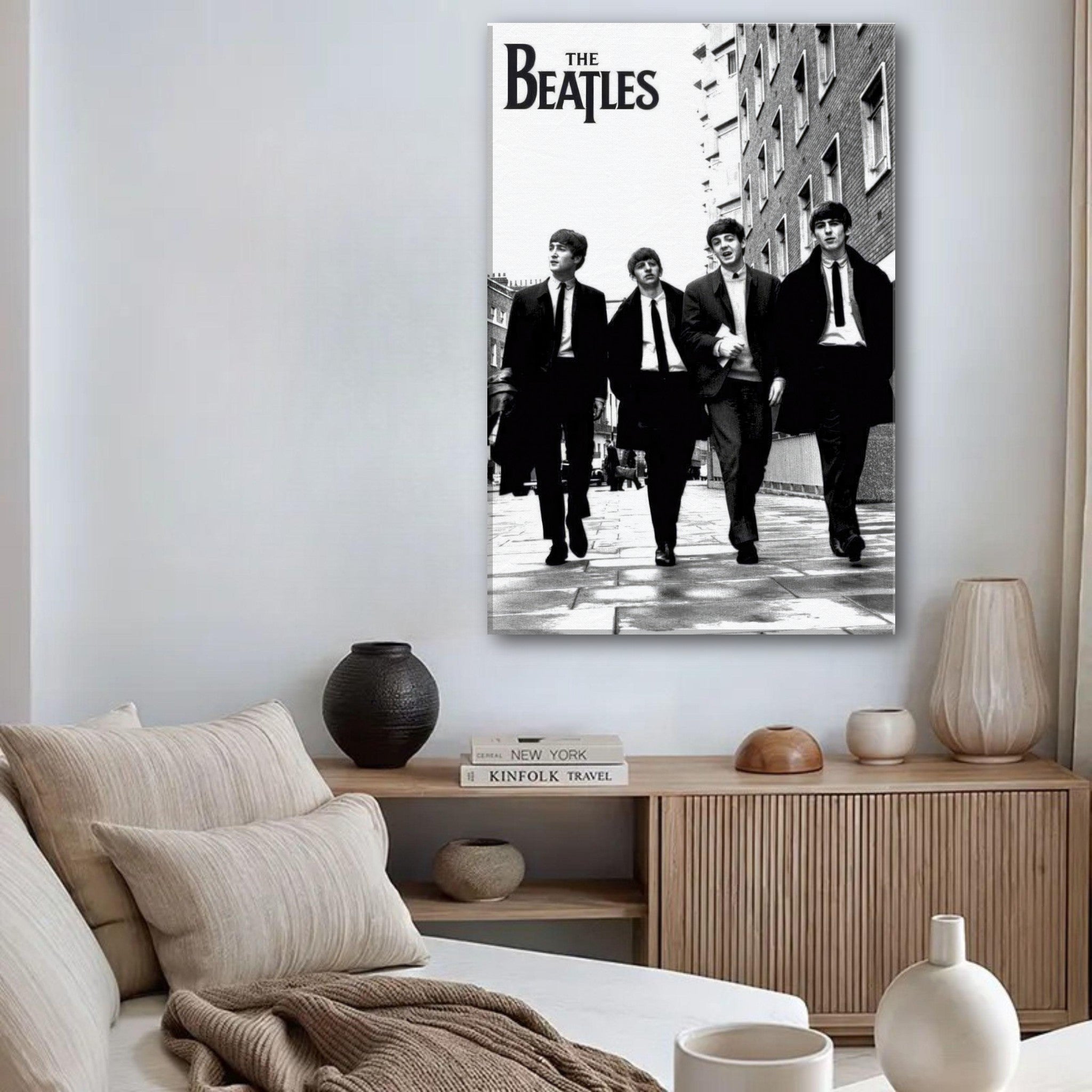The Beatles cover canvas print featuring the iconic band in black and white, displayed in a stylish modern living room.