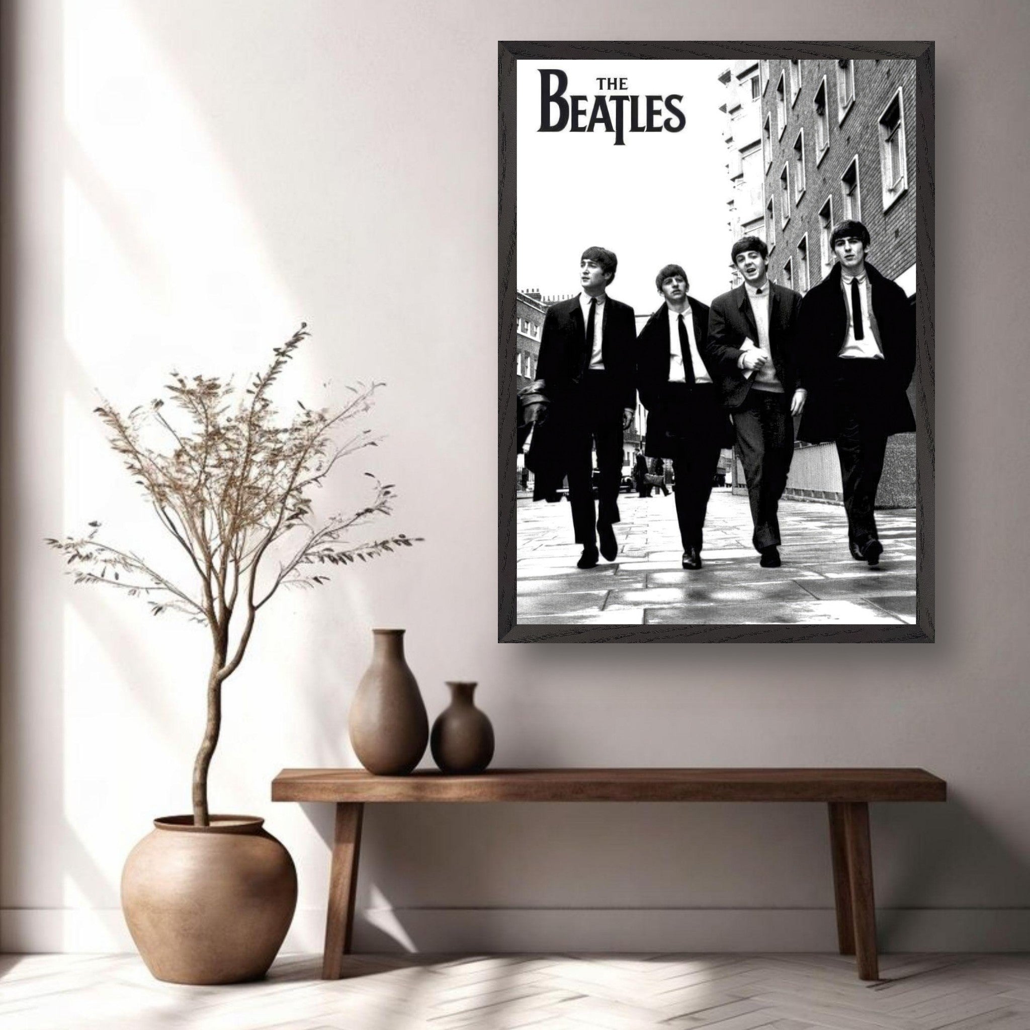 The Beatles fine art print displayed in a modern living room setting with decorative plants and furniture.