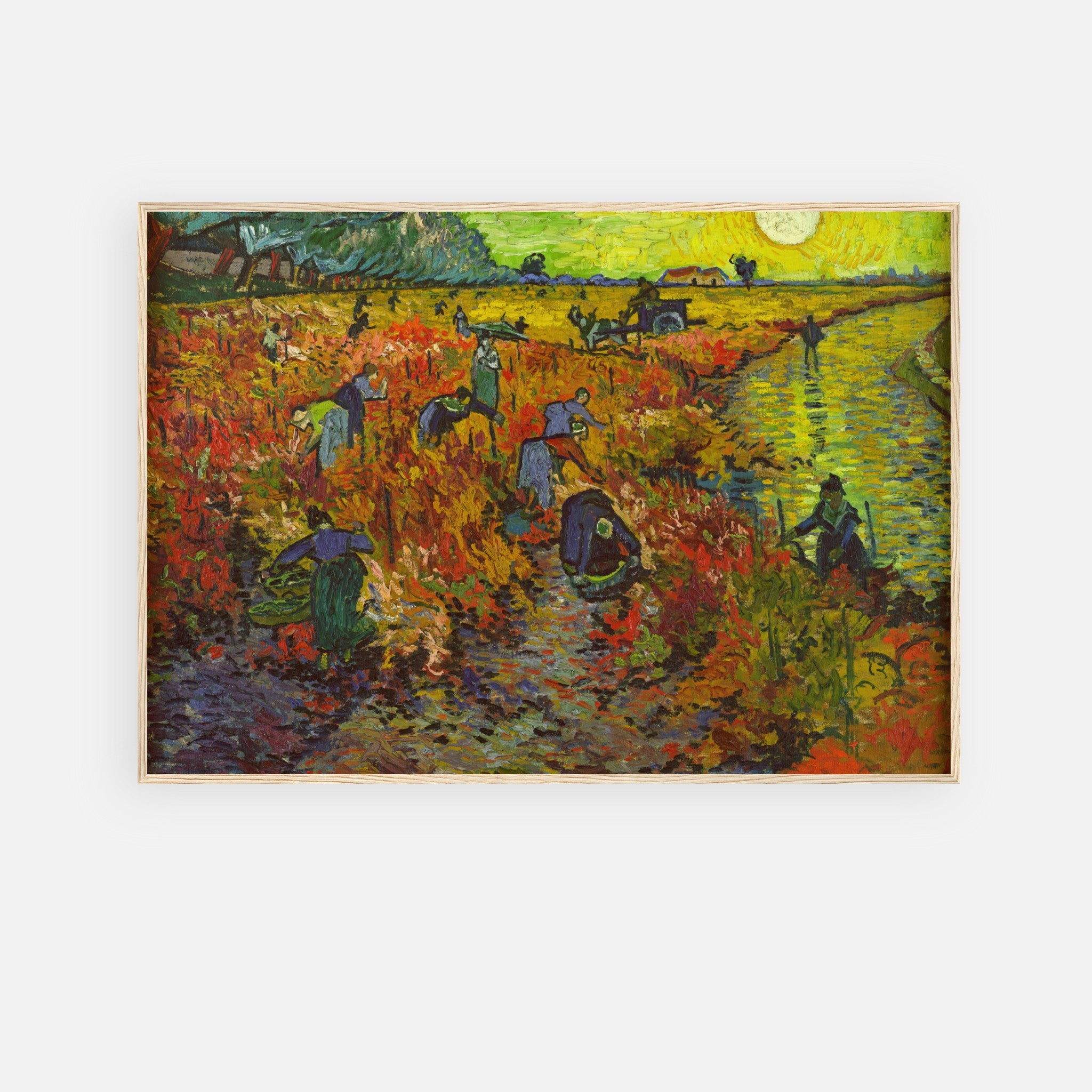 Framed print of Van Gogh's The Red Vineyard, featuring vibrant autumn colors and harvest scene.