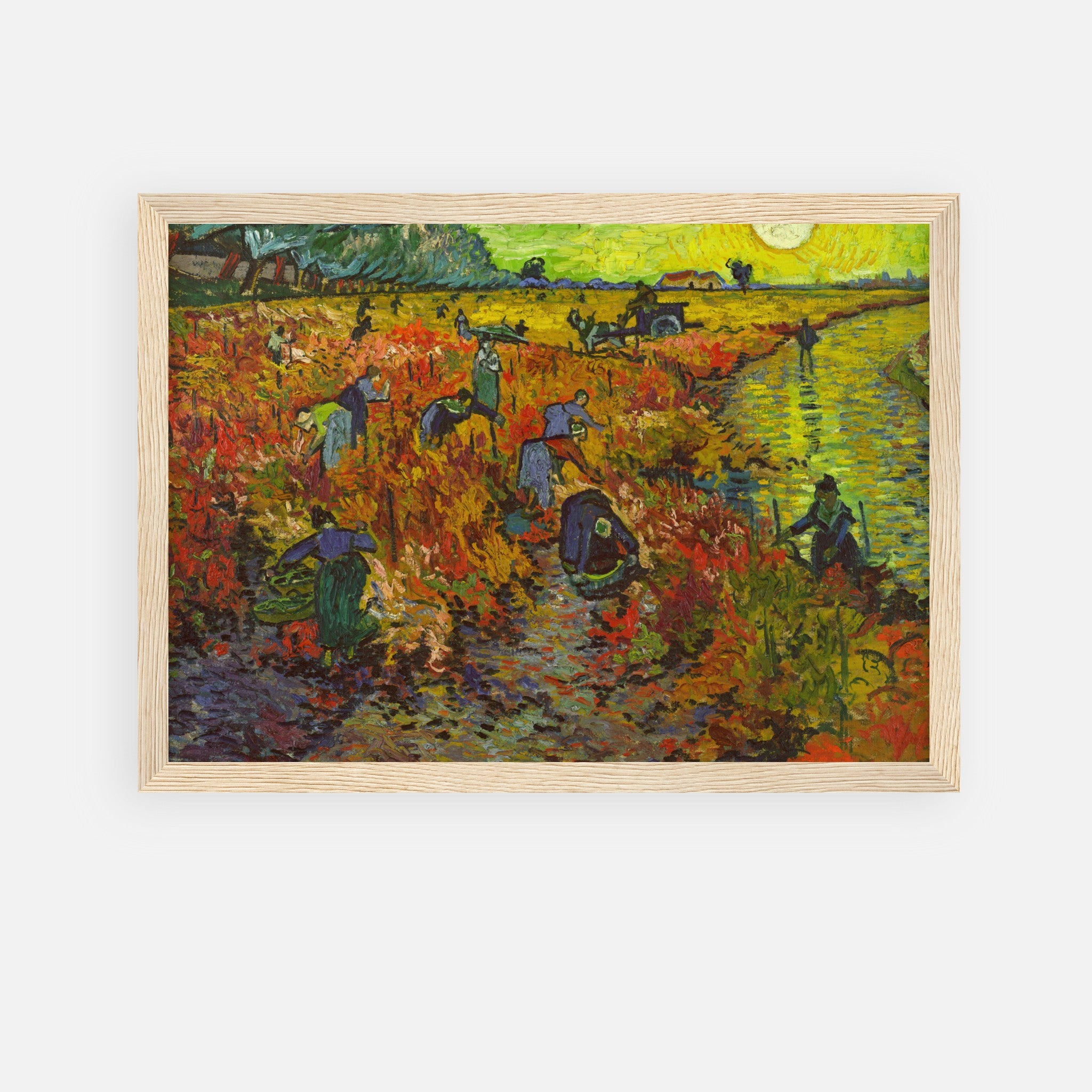 Framed print of Van Gogh's The Red Vineyard, depicting a vibrant autumn harvest scene with bold colors.